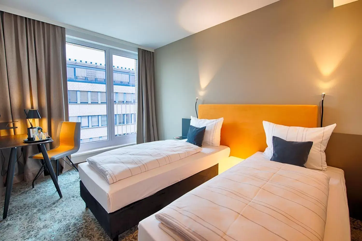 Photo of the whole room, Bed in LOGINN Hotel Leipzig by ACHAT