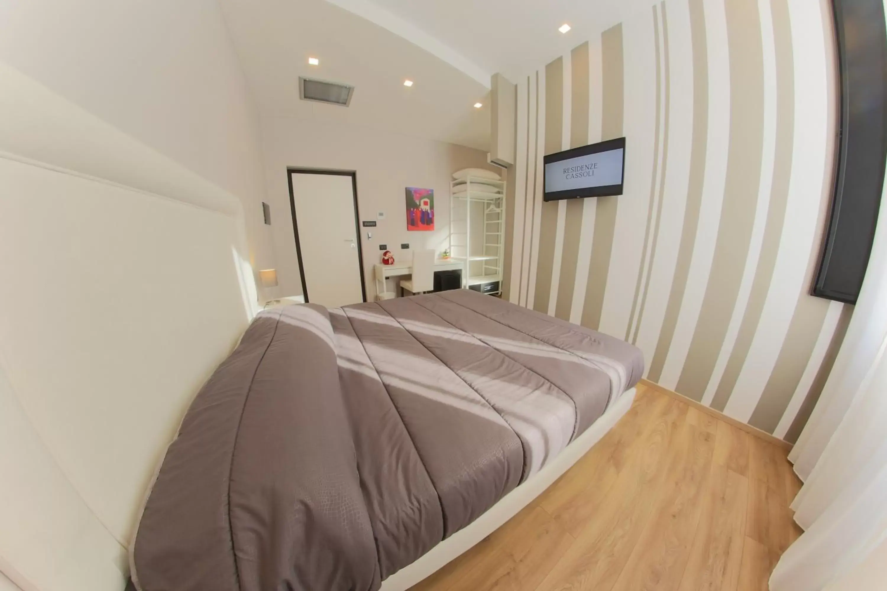 Bed in RESIDENZE CASSOLI B&B Luxury Spa