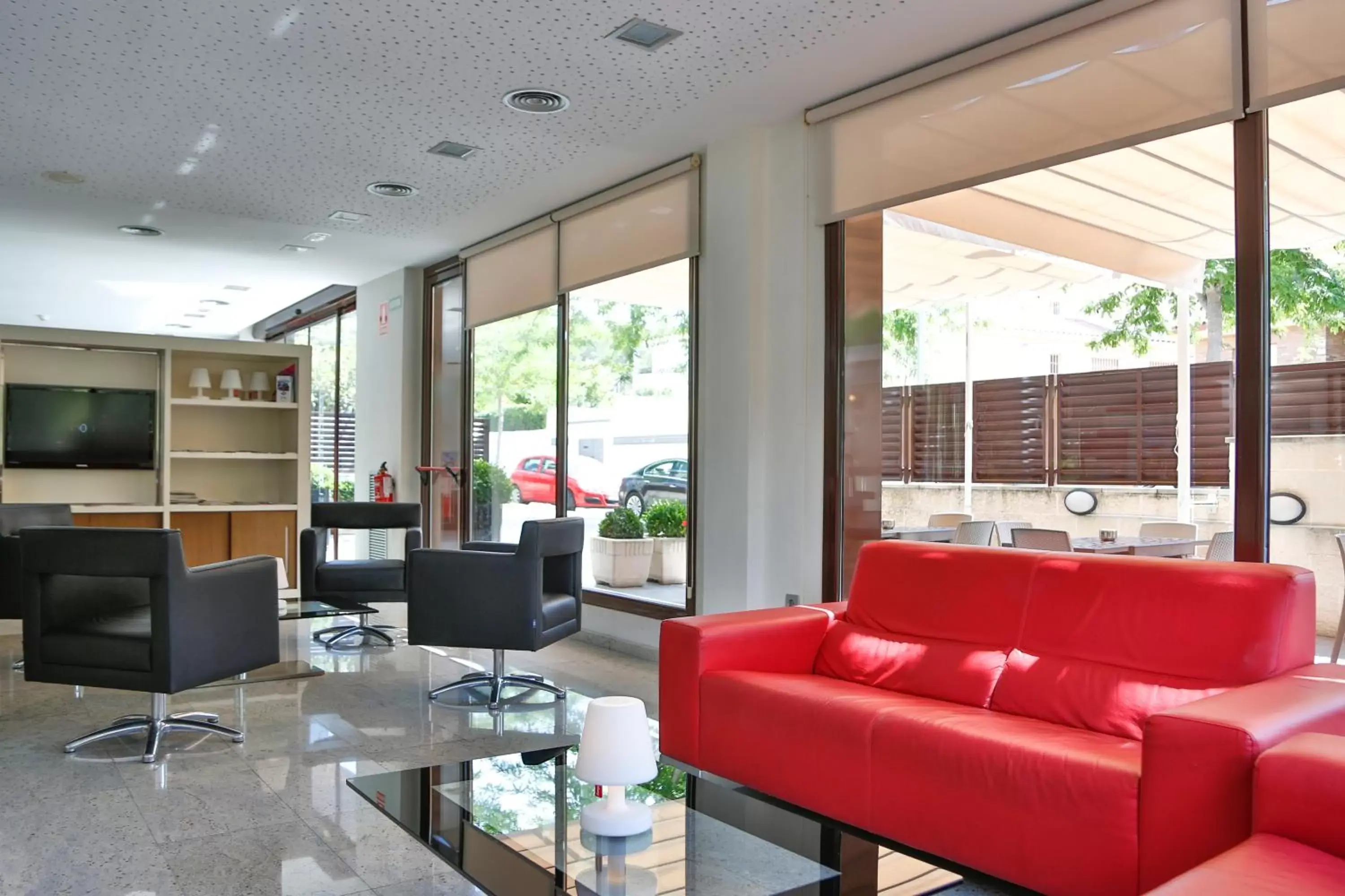 Communal lounge/ TV room, Seating Area in Hotel Desitges