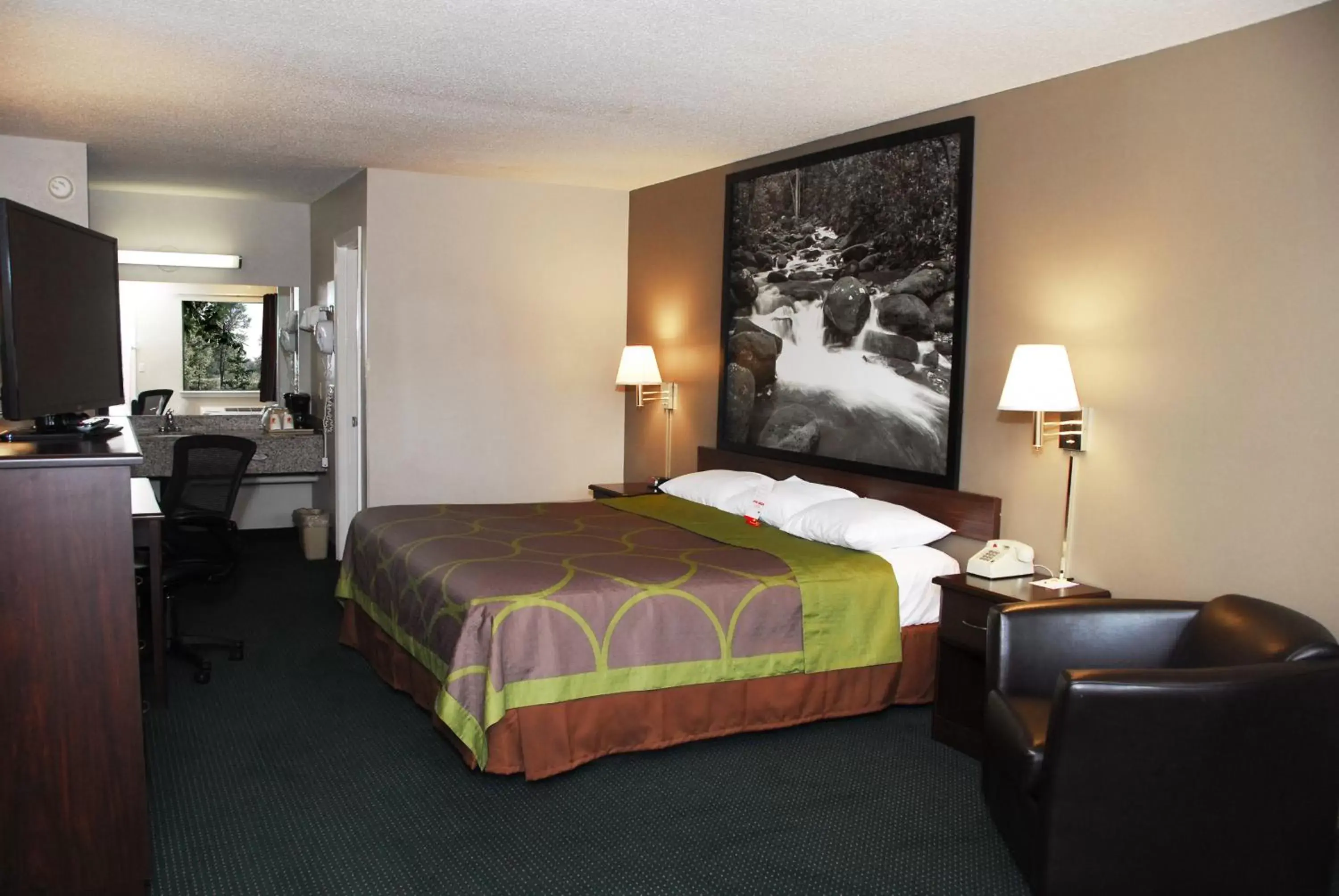Bed in Super 8 by Wyndham Chattanooga Ooltewah