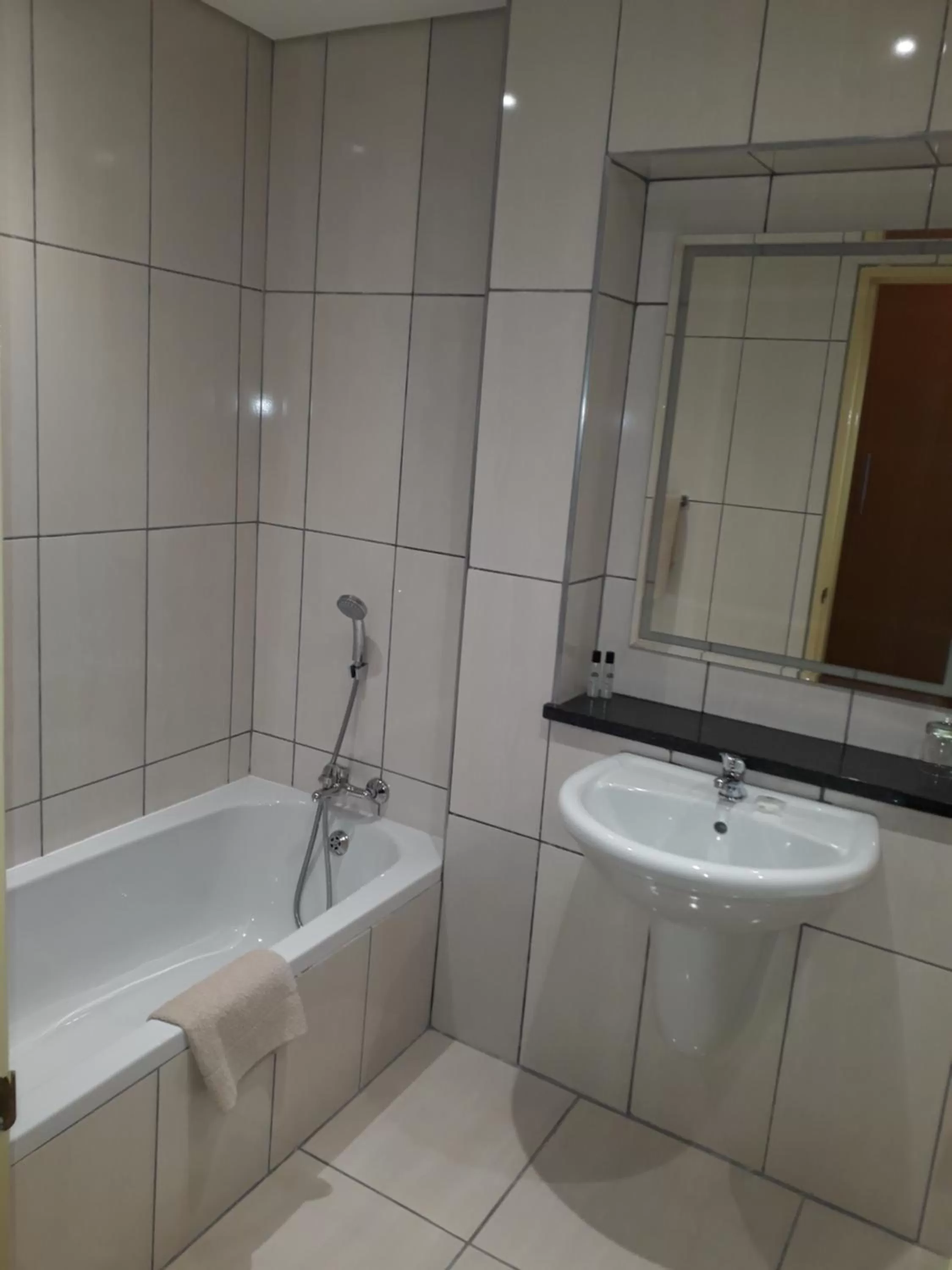 Bathroom in African Sky Hotels - Pine Lake Inn