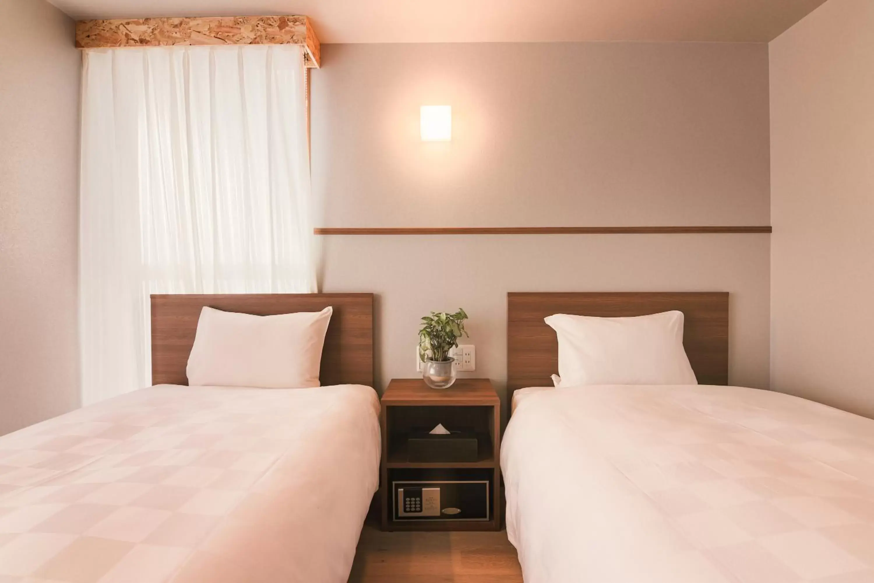 Bed in WAYFARER Kyoto Shijo Bed in WAYFARER Kyoto Shijo