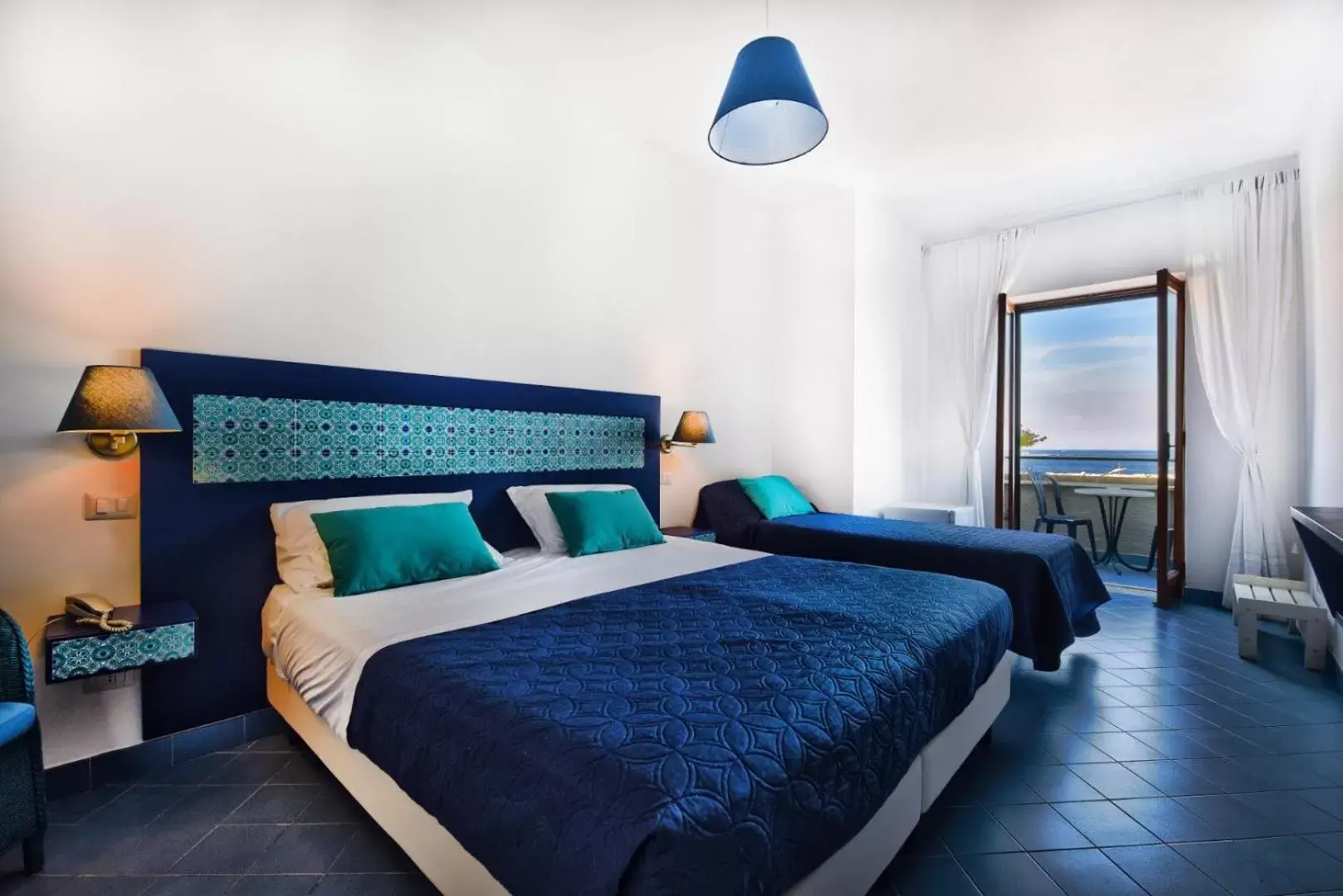 Bed in Hotel Baia Di Puolo