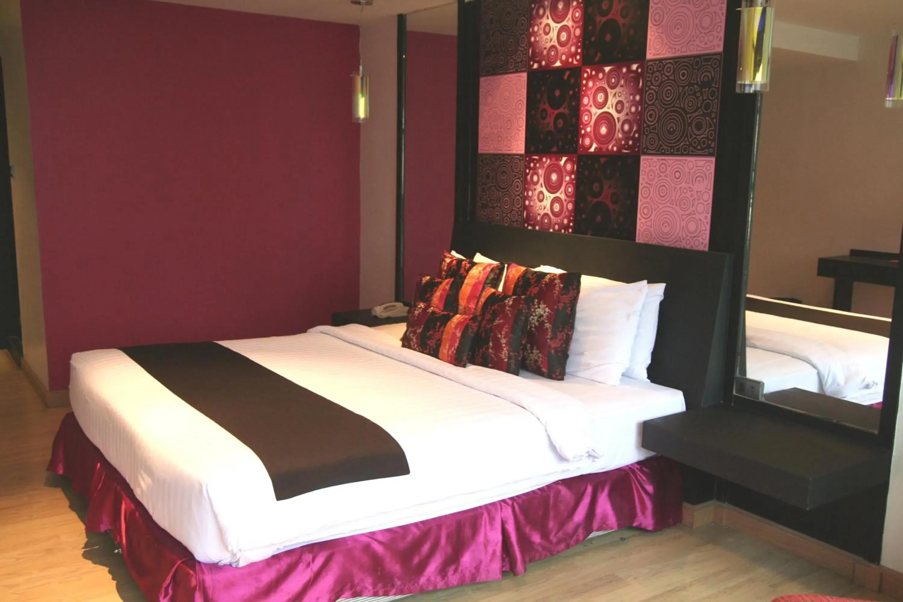 Bed in Grand Inn Hotel
