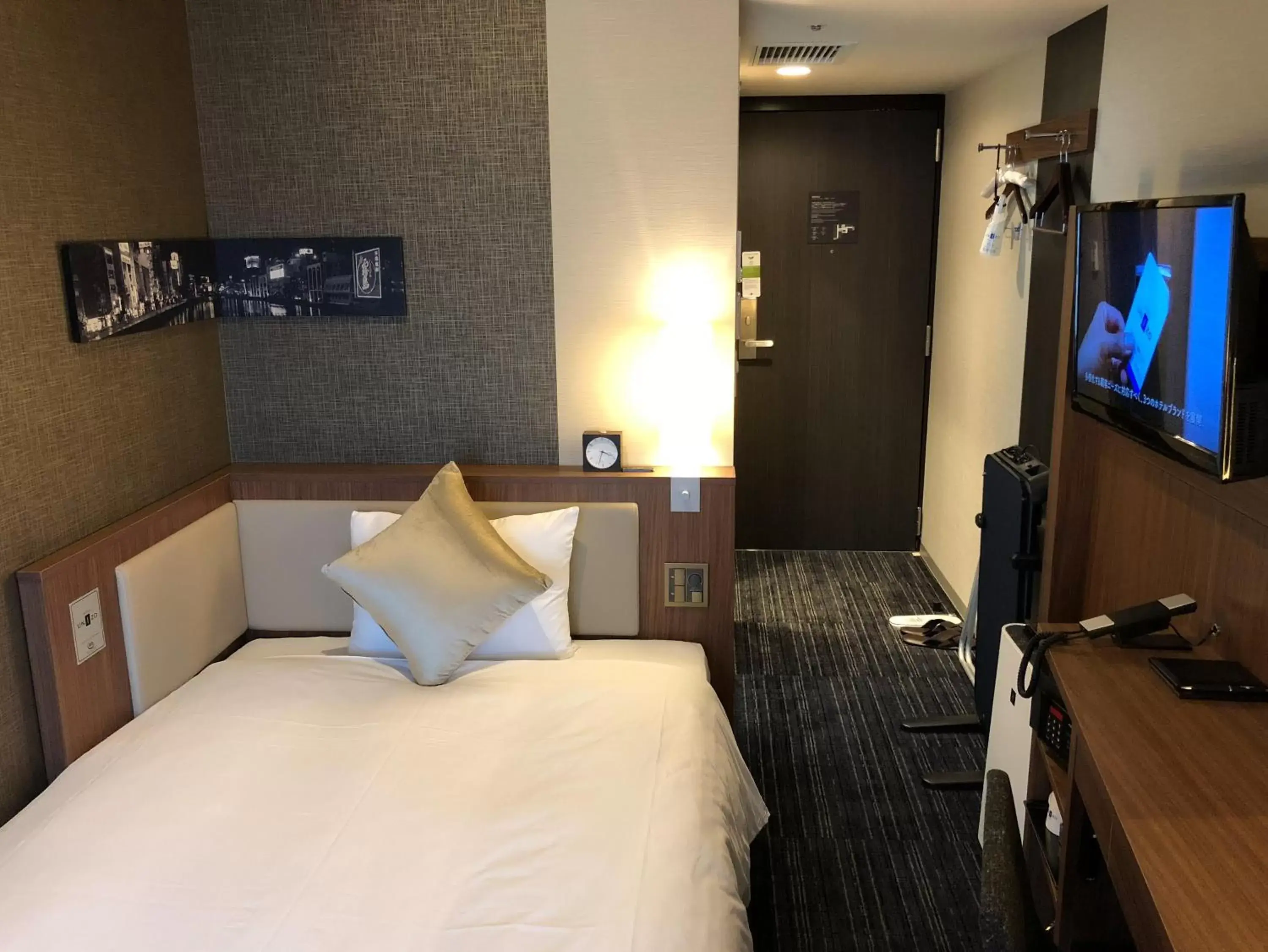 TV and multimedia, Bed in HOTEL UNIZO Hakataeki Hakataguchi