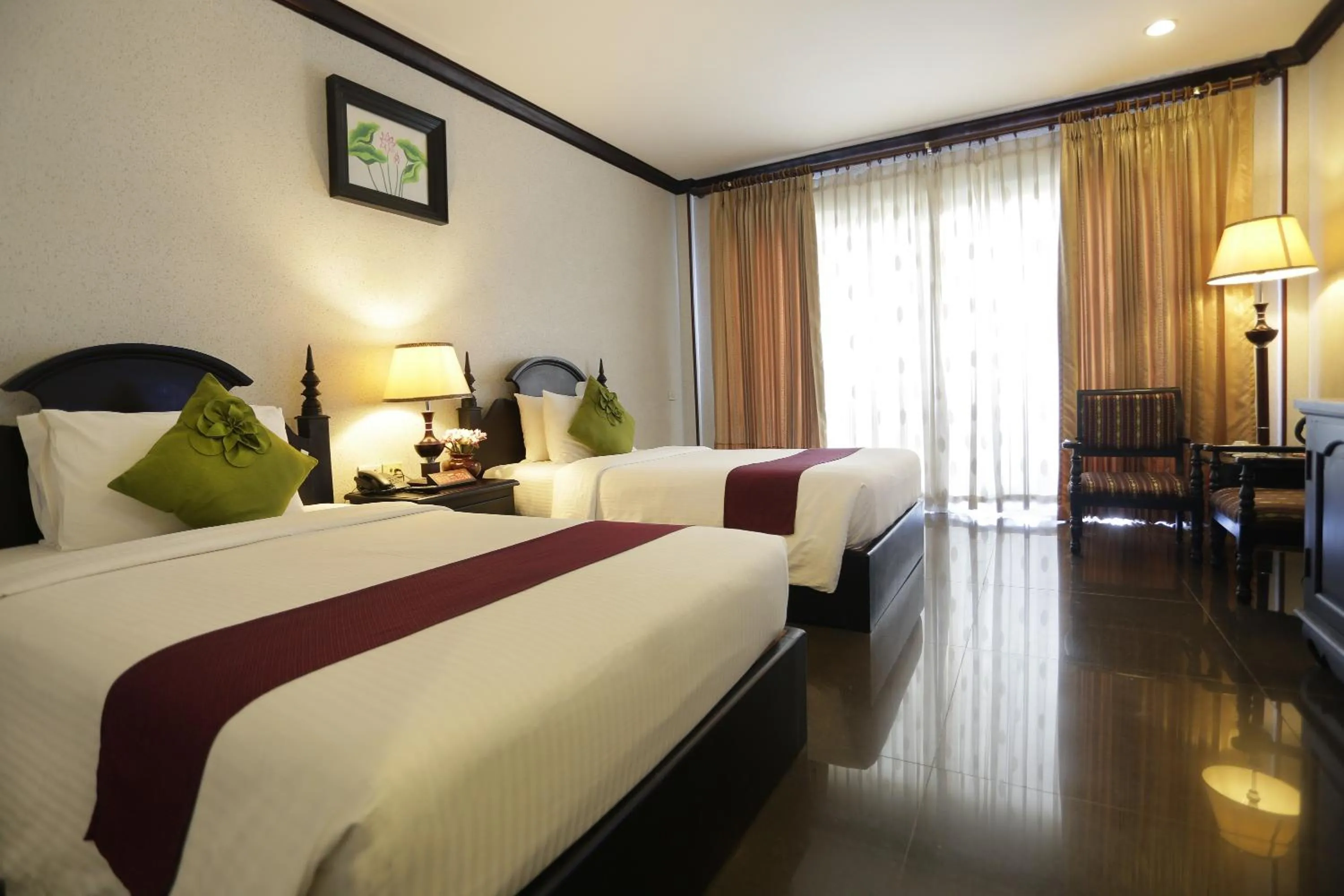 Bed in Lucky Angkor Hotel & Spa