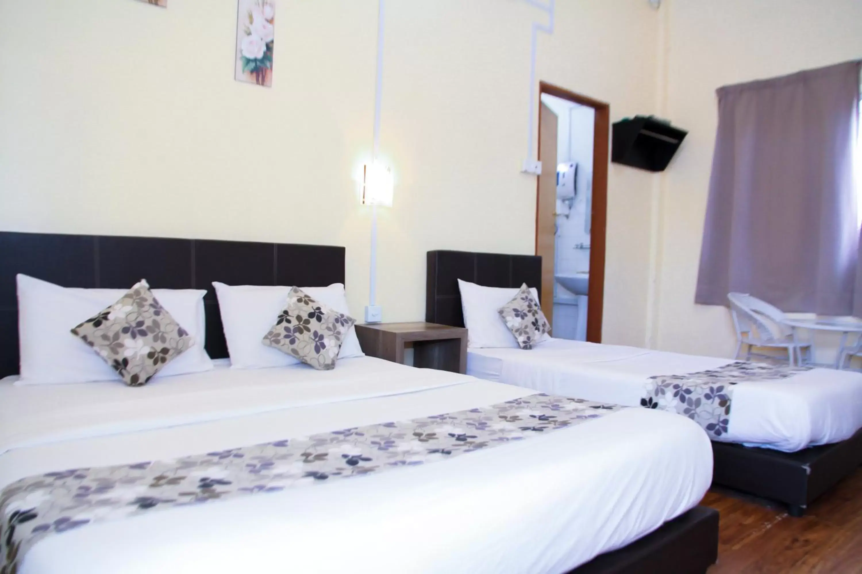 Bed in Myra Hotel Mersing