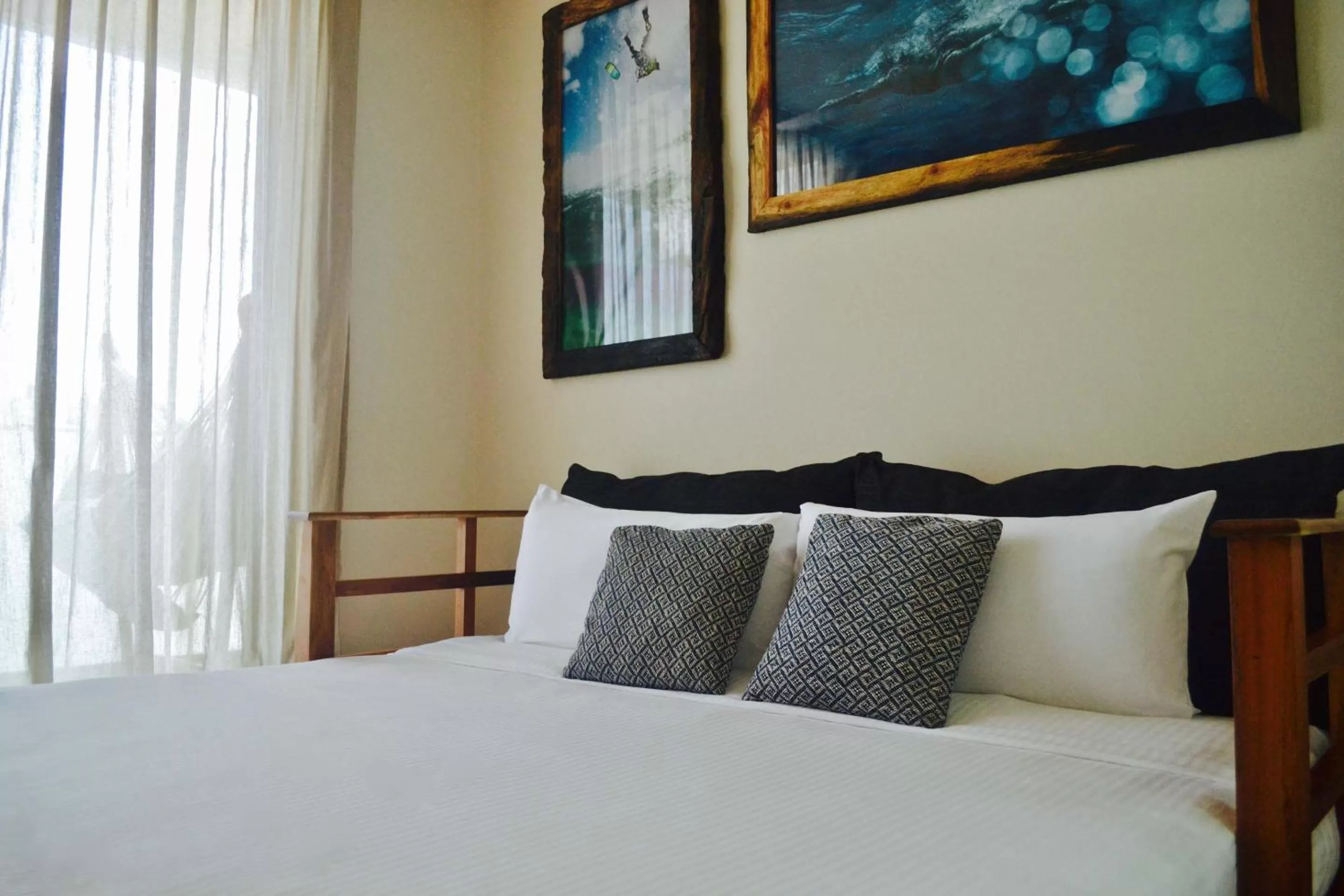 Bed in Newport House Playa Boutique Hotel