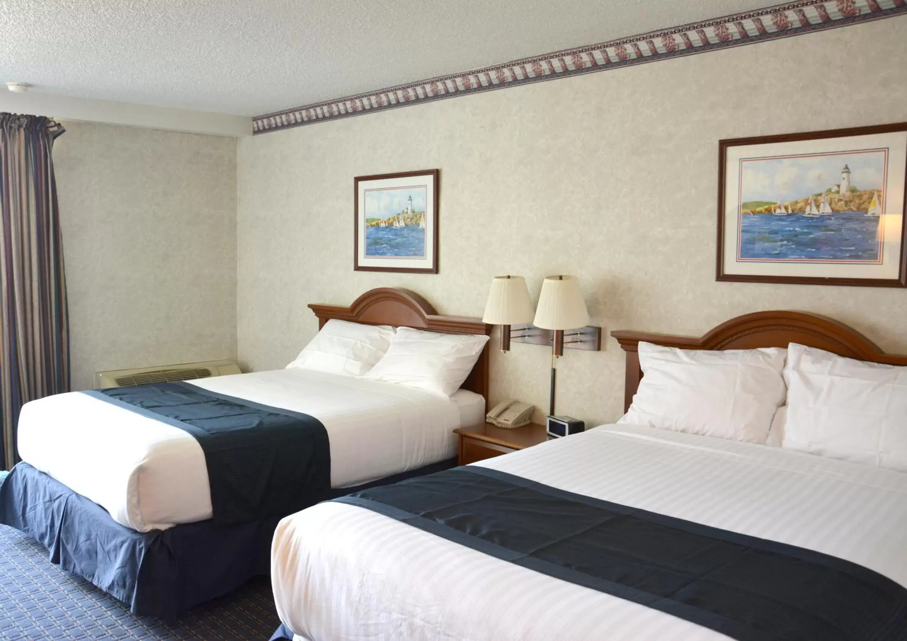 Bed in Travelodge by Wyndham Milwaukee Bed in Travelodge by Wyndham Milwaukee