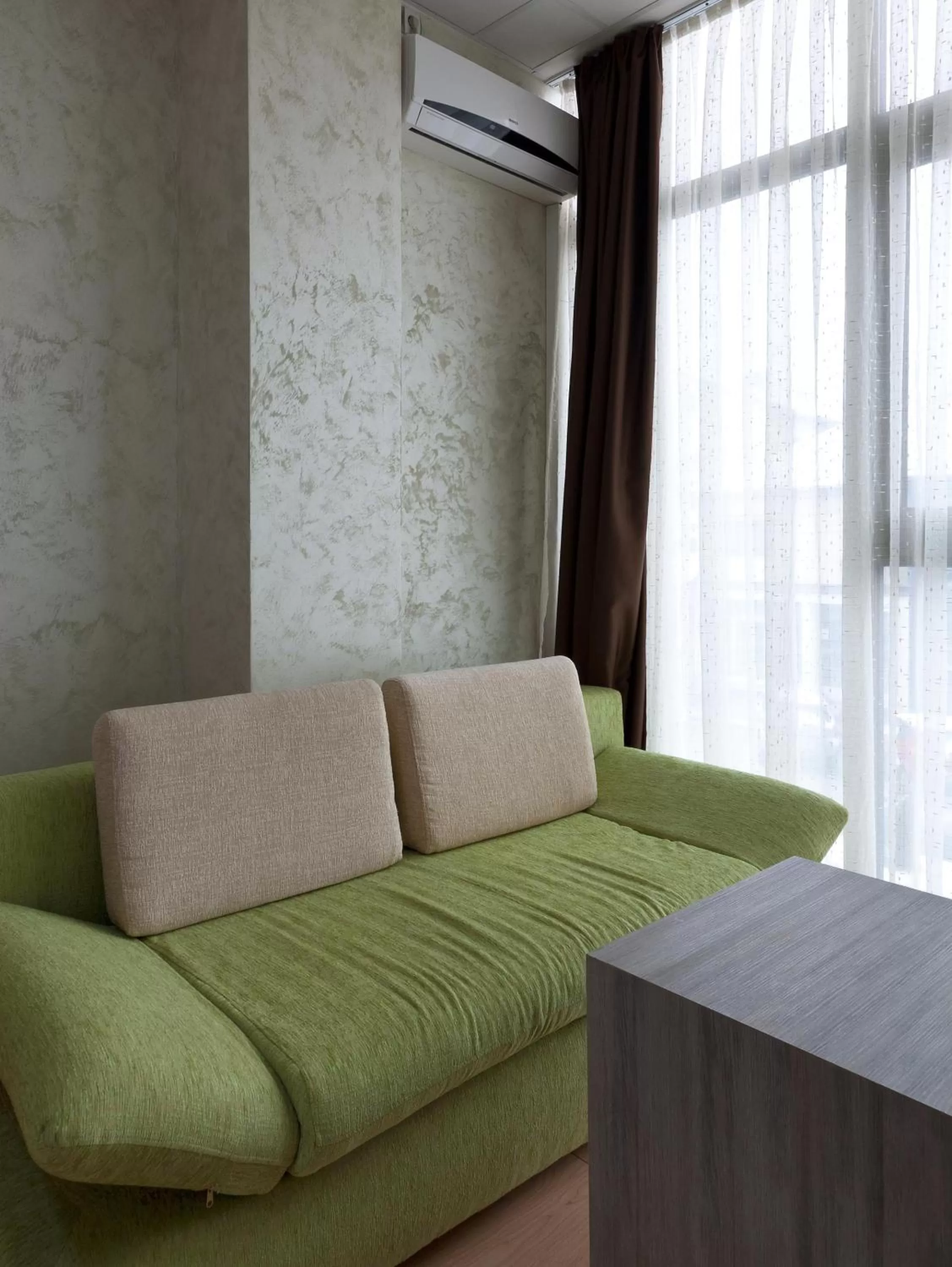 Seating area in Hotel Green Center Gili