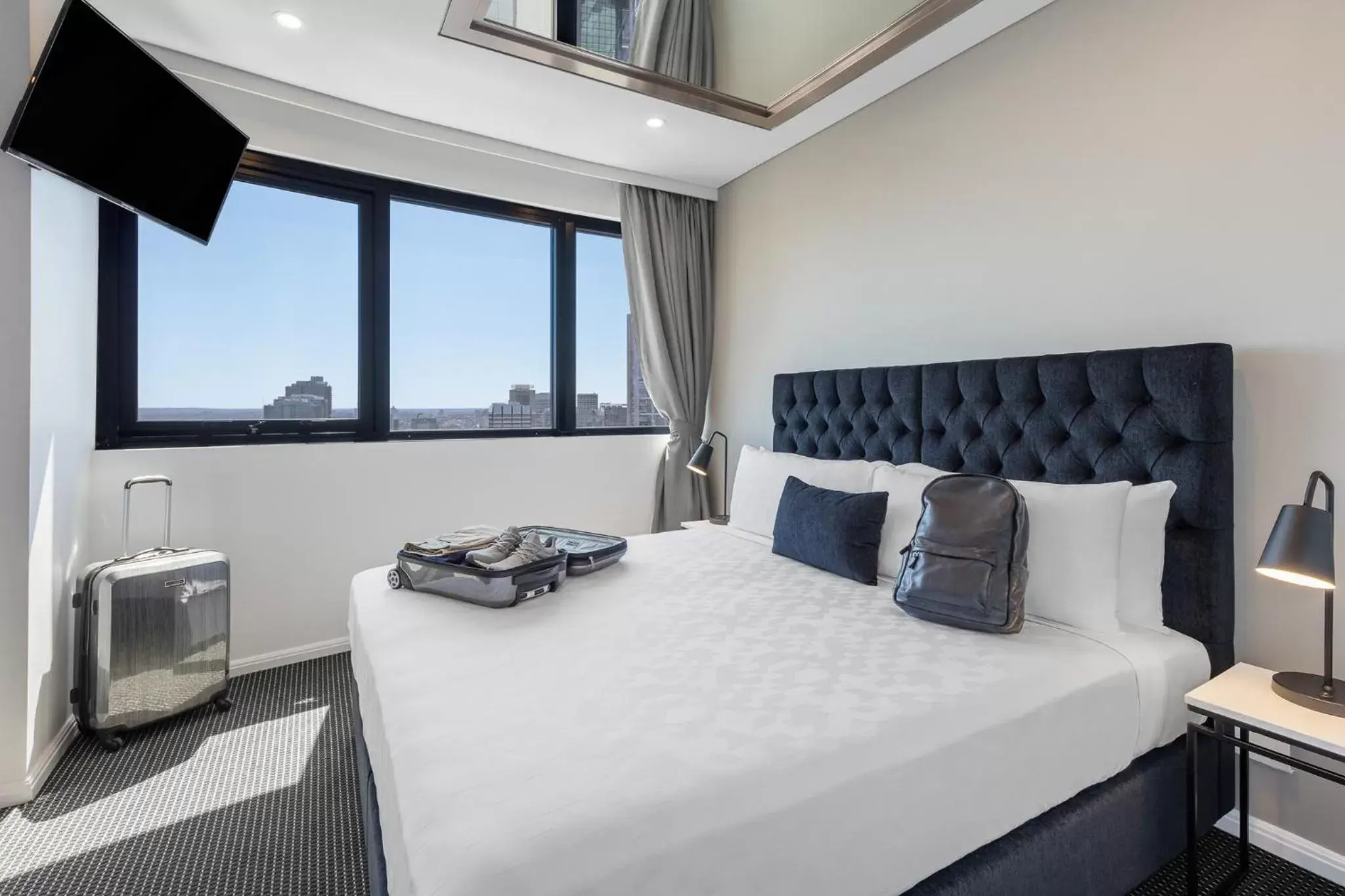 Bed in Meriton Suites Kent Street, Sydney