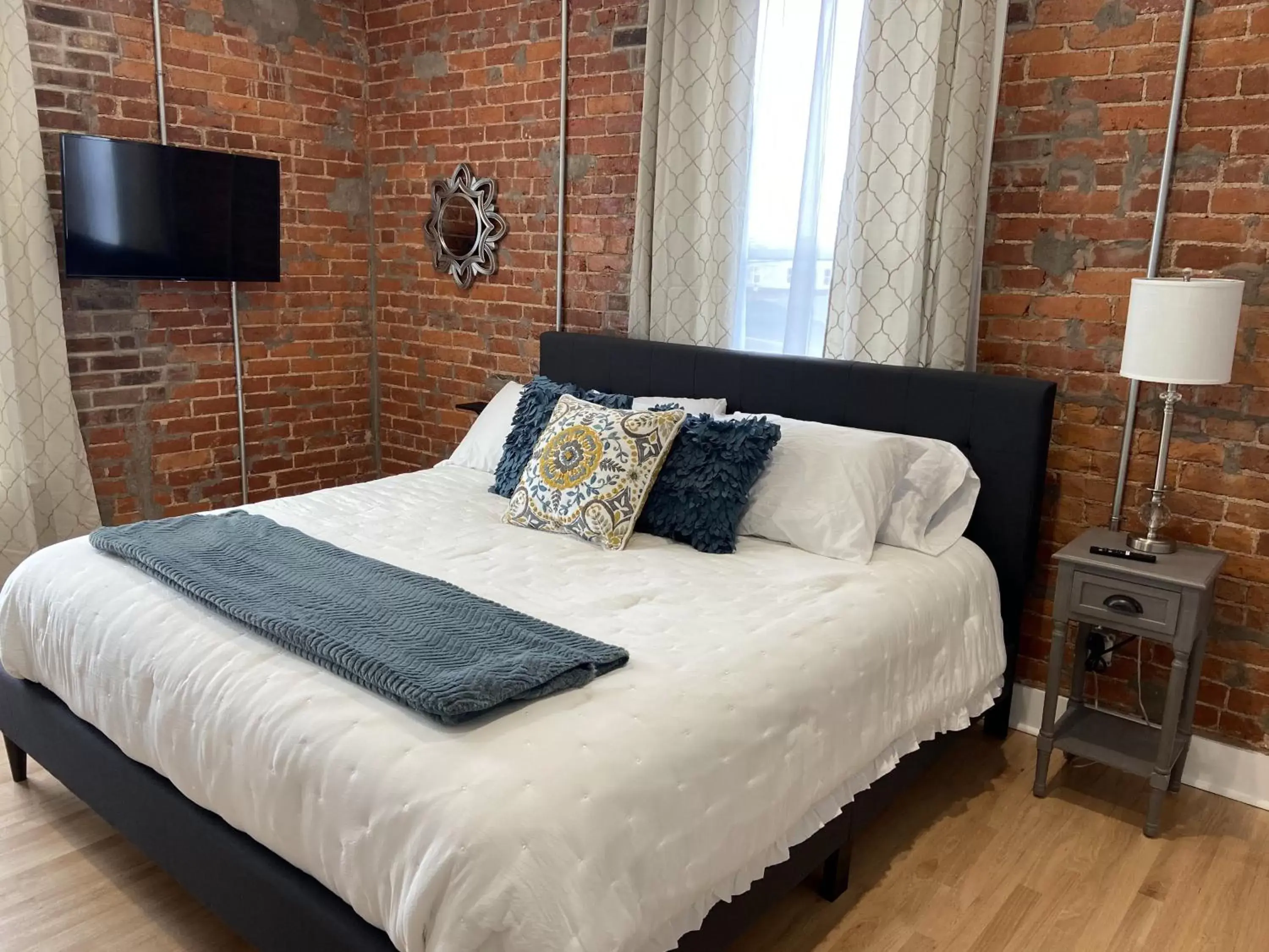 Bed in Brickhouse Loft - a boutique hotel