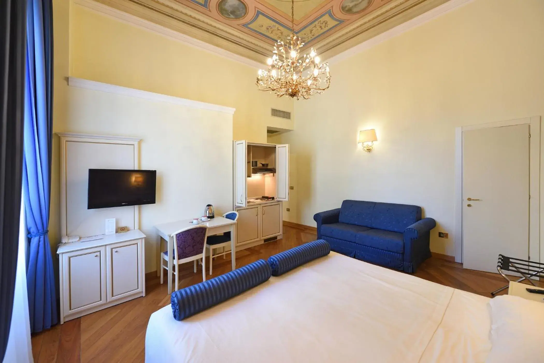 Bedroom, Seating Area in Relais La Corte di Cloris