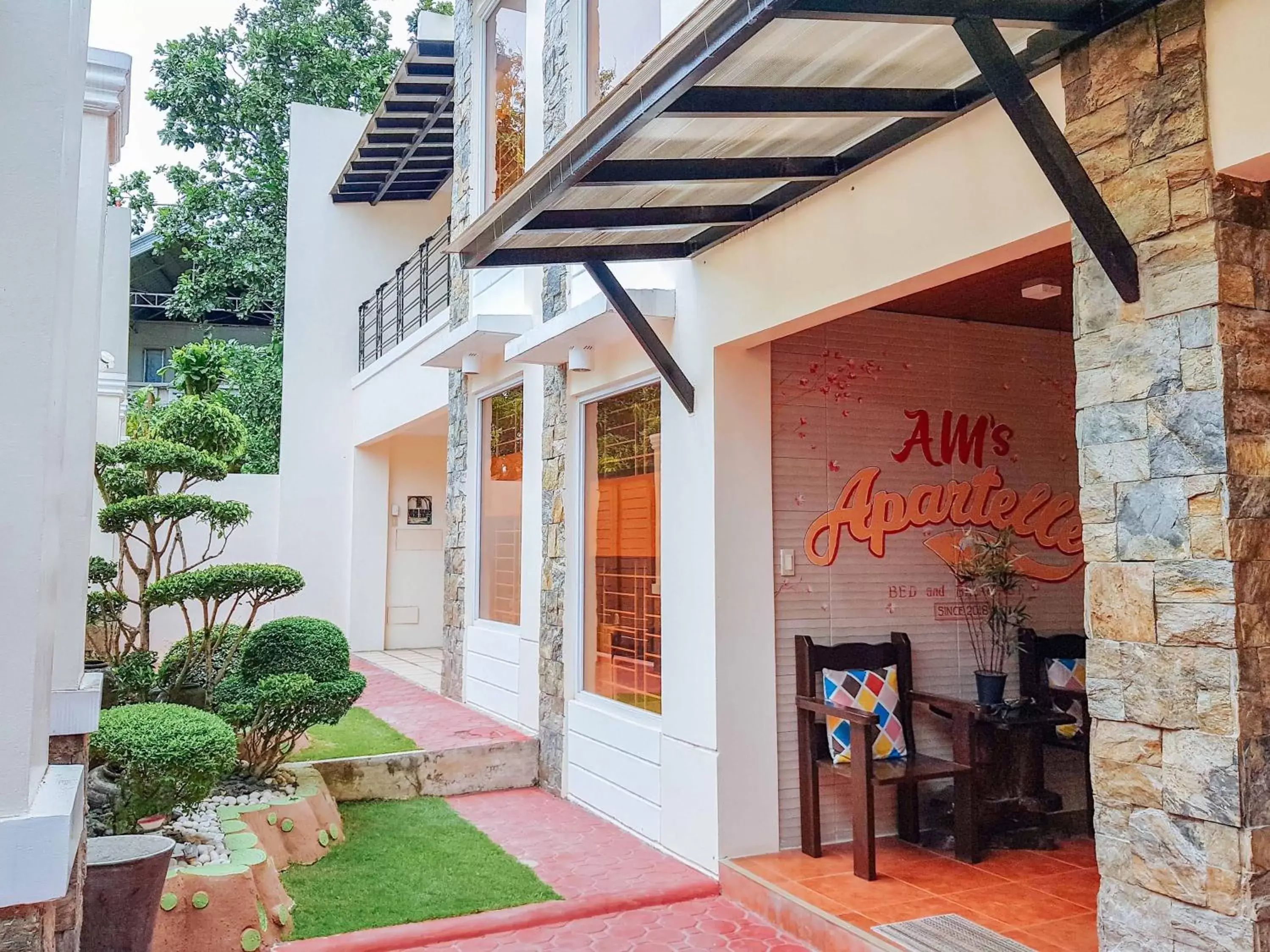 Property building in RedDoorz @ Caimito Drive Dampas Property building in RedDoorz @ Caimito Drive Dampas