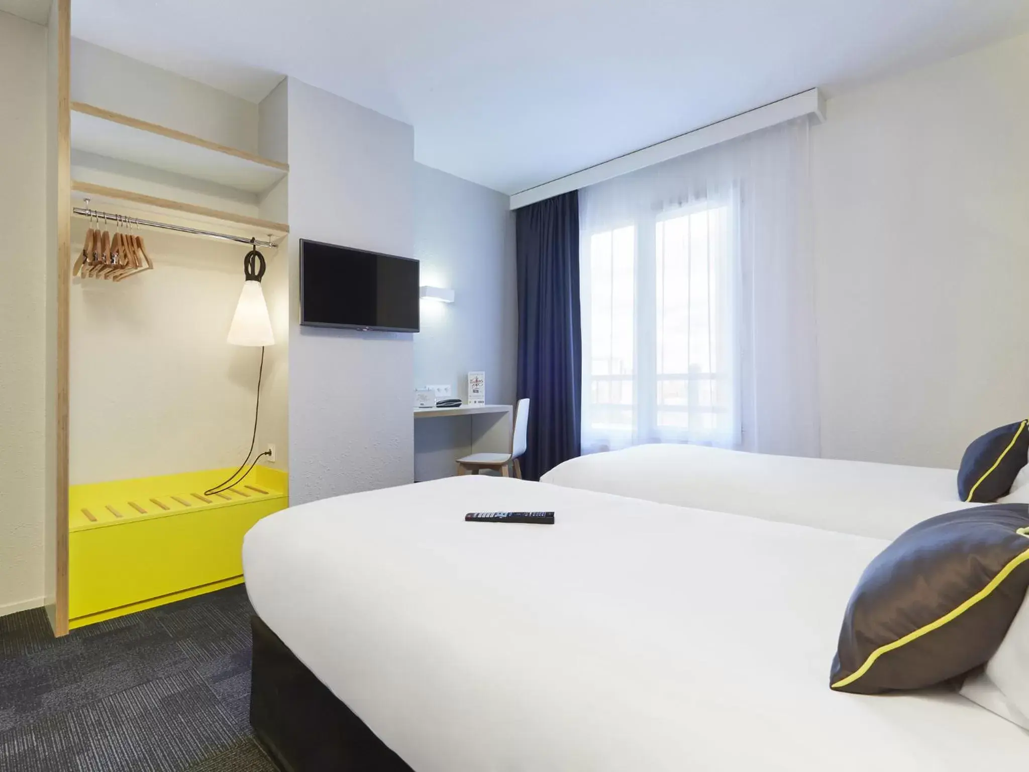 Bed in Kyriad Hotel Brest