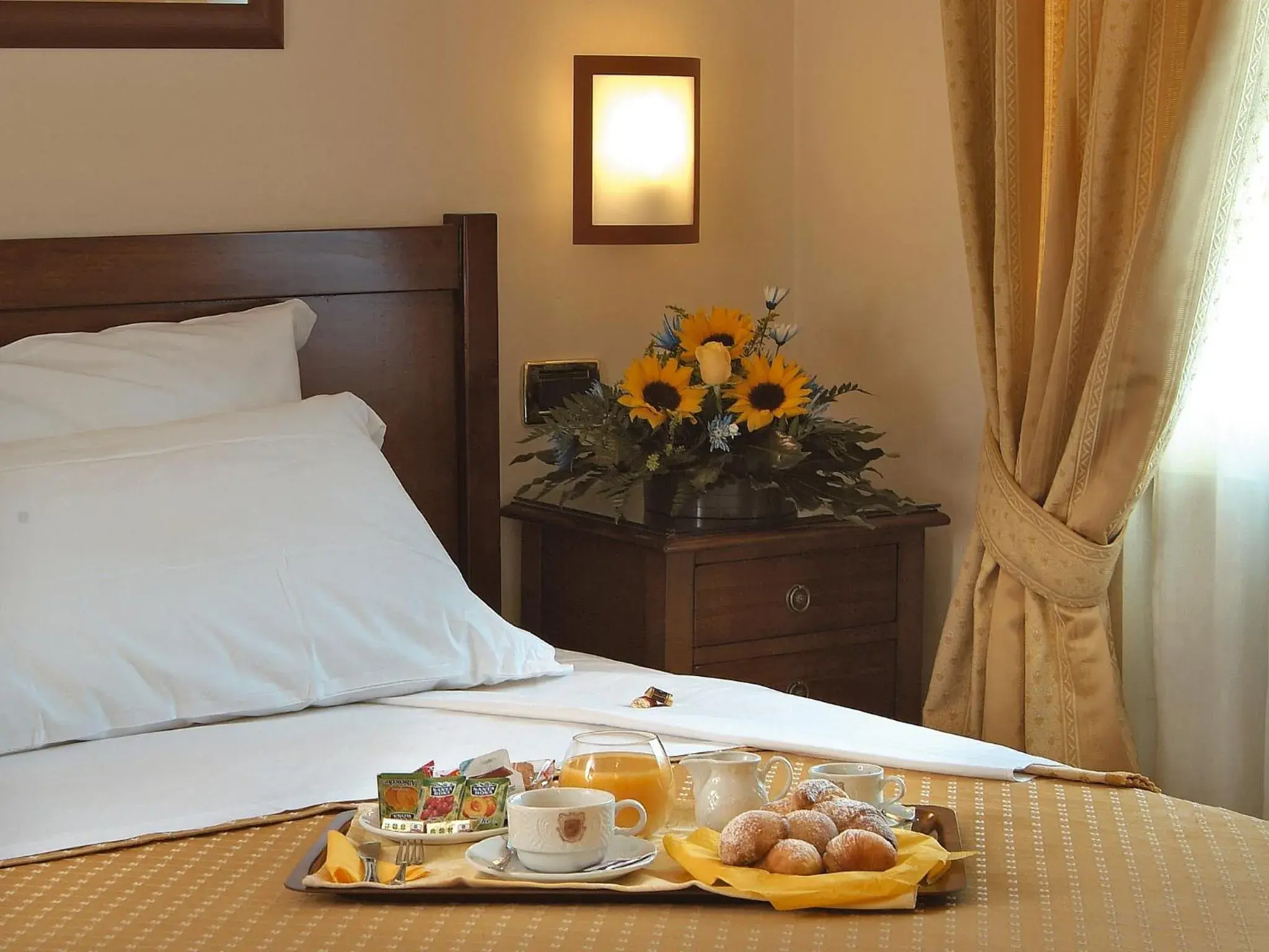 Bed in Buono Hotel