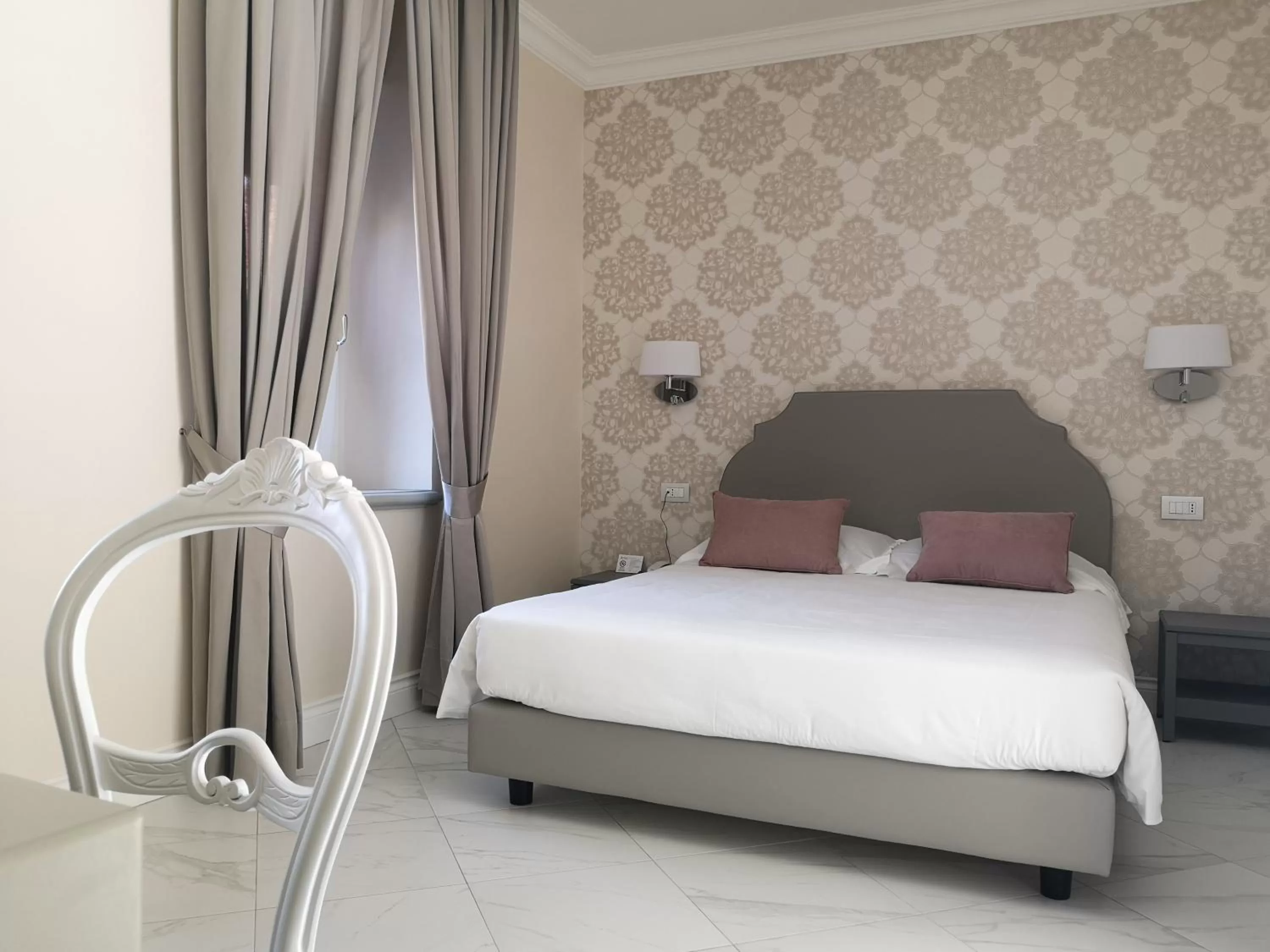 Bed in Altavilla Boutique Hotel