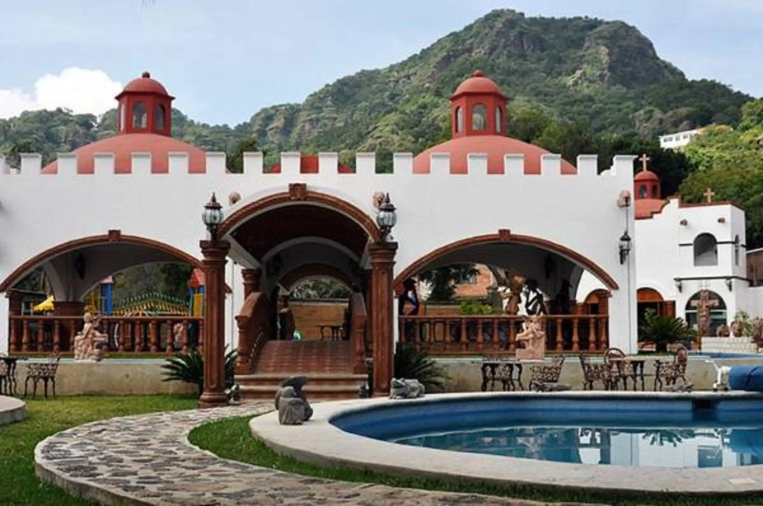 Pool view, Property Building in Hotel Leyenda del Tepozteco