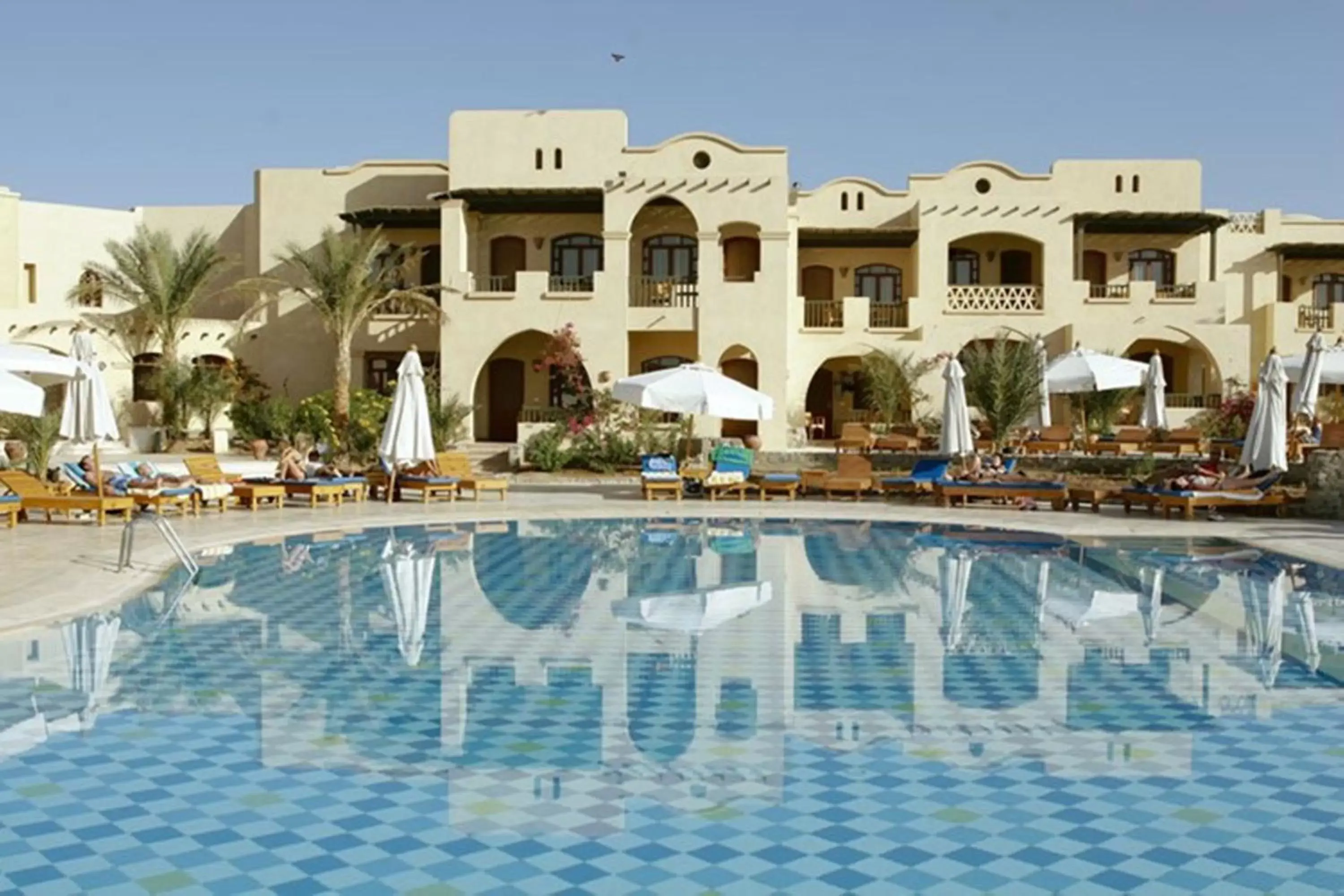 Swimming pool, Property Building in The Three Corners Rihana Resort El Gouna