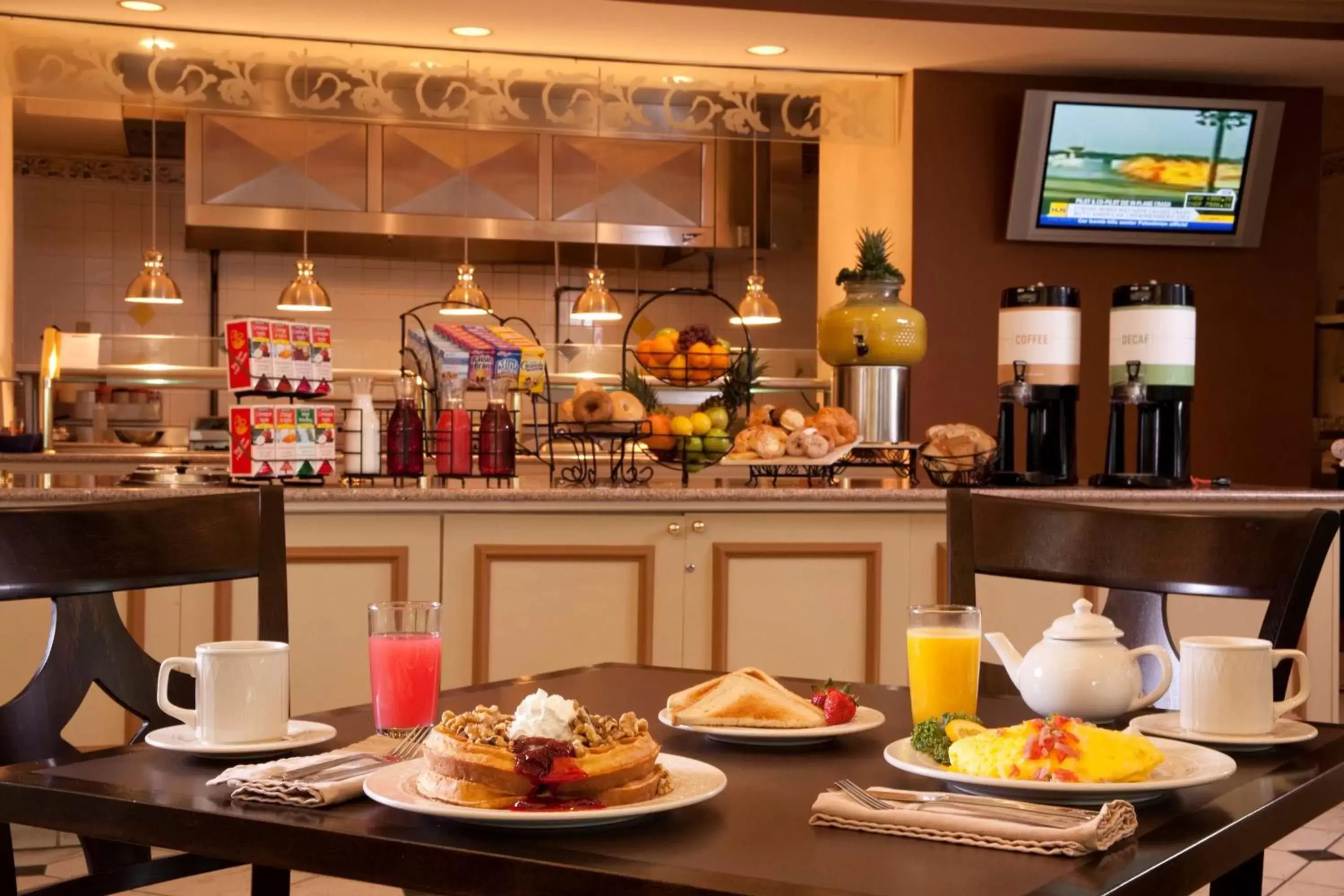 Dining area, Breakfast in Hilton Garden Inn Tampa North