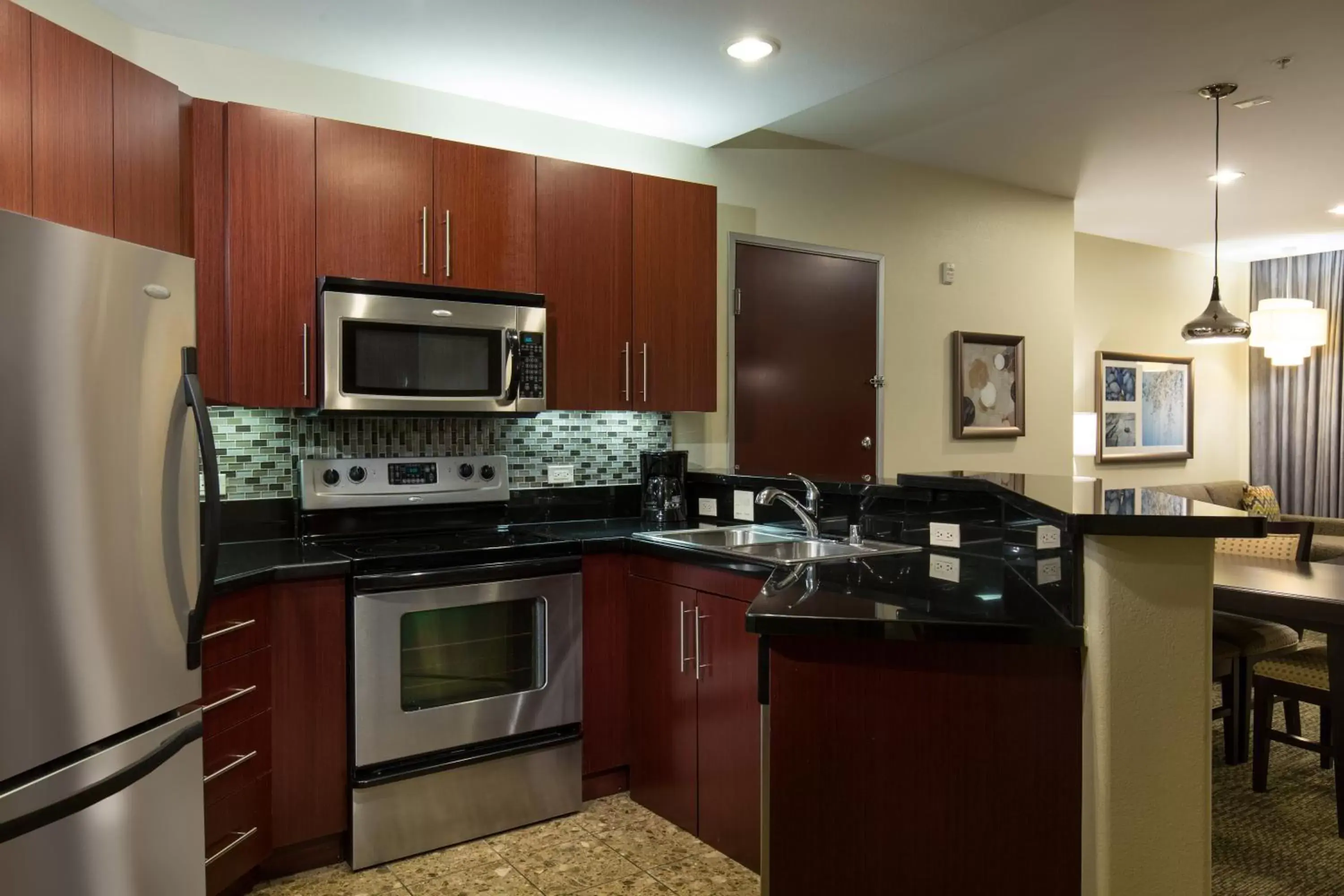 Kitchen/Kitchenette in Staybridge Suites Las Vegas - Stadium District