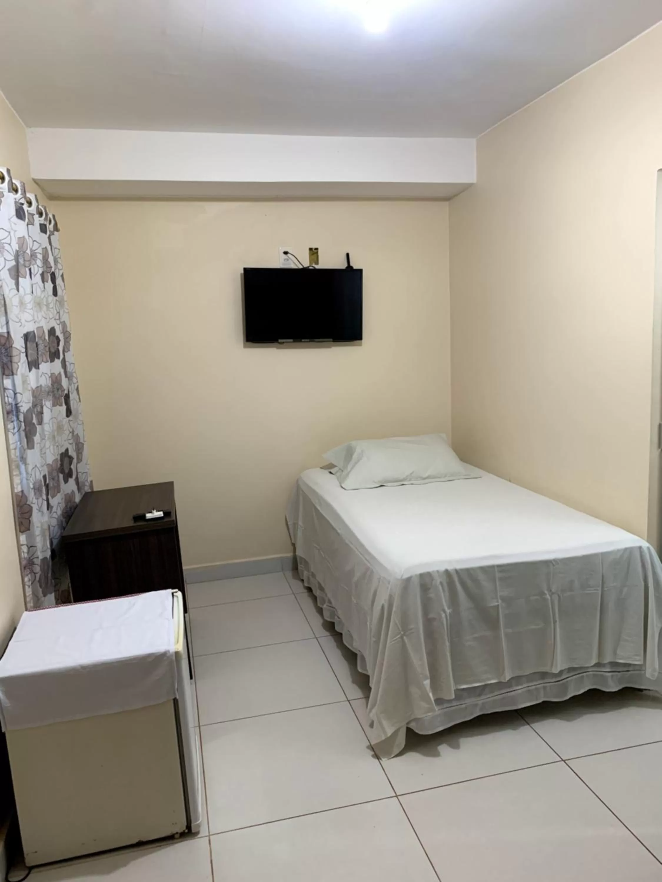 Bed in Pousada Jardim Brasília