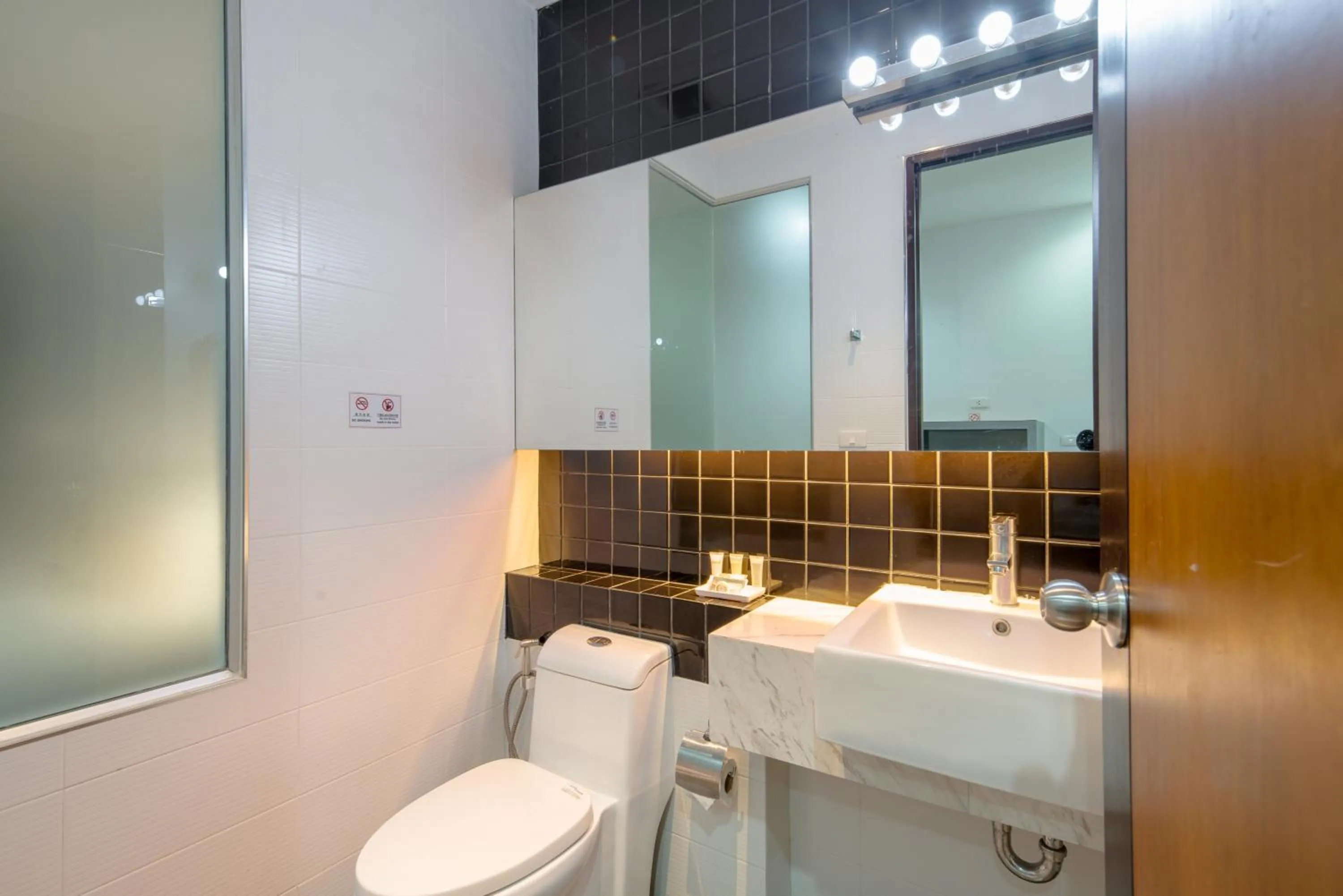 Toilet in DARA Hotel - SHA Plus