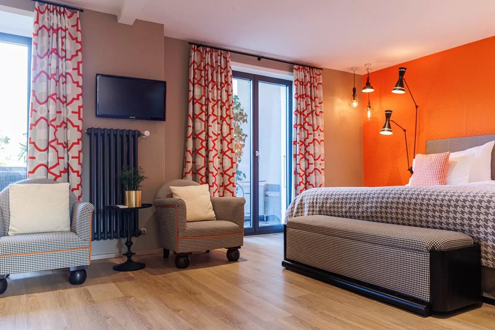 Bed, TV/Entertainment Center in Art Hotel Riposo