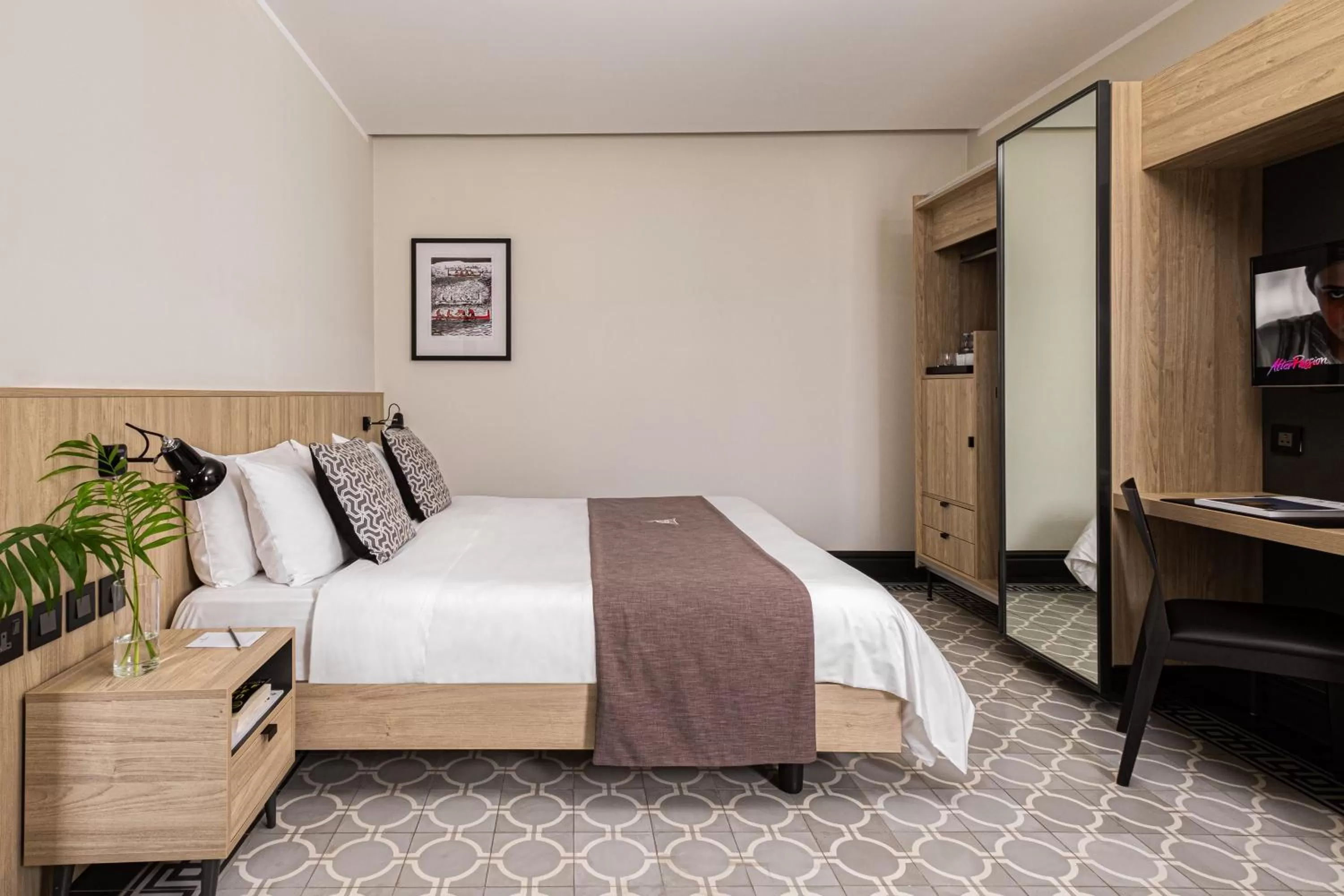 Bed in La Falconeria Hotel