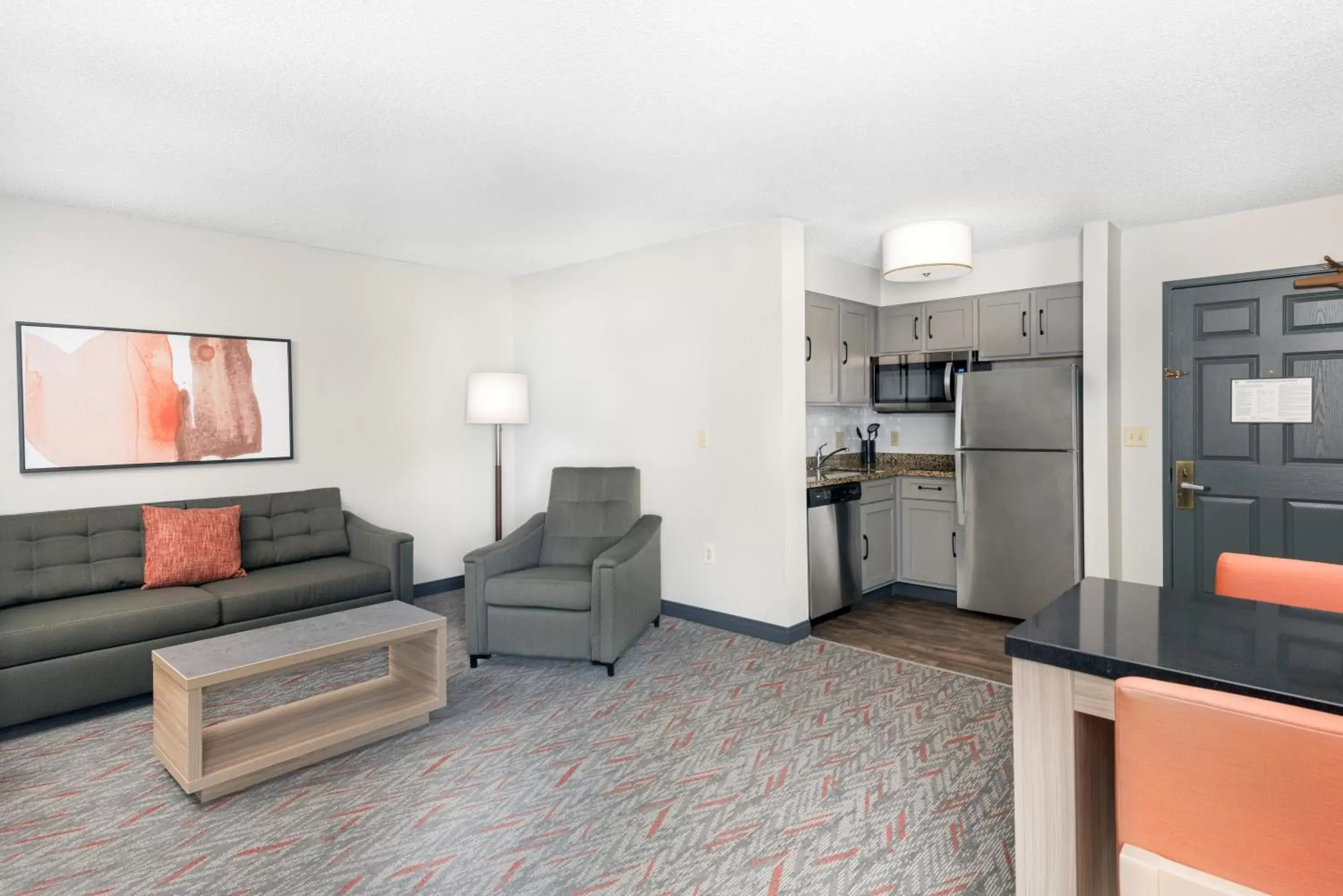 Kitchen or kitchenette, Seating Area in Candlewood Suites Eagan - Mall of America Area, an IHG Hotel