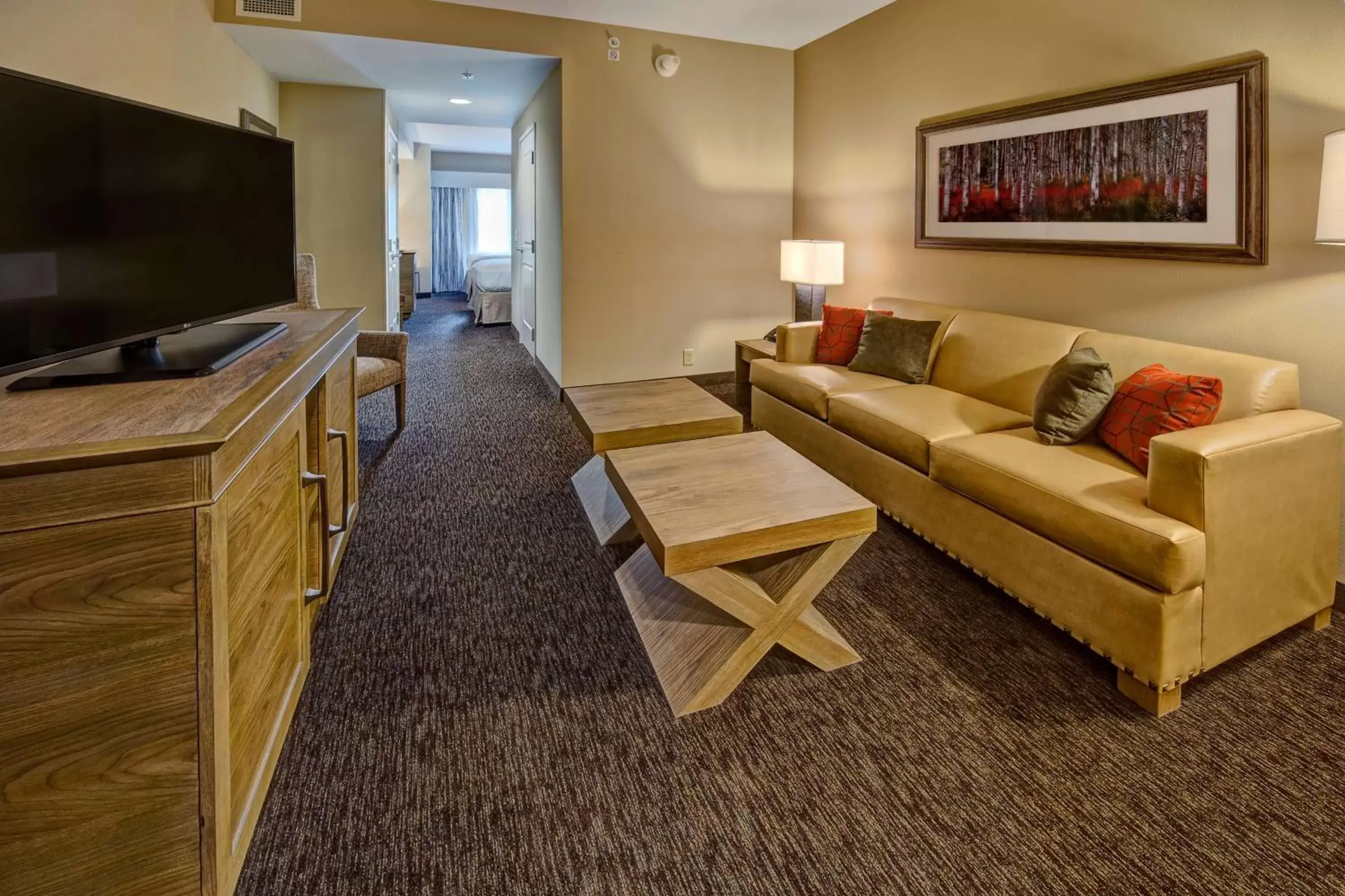 Bedroom, Seating Area in Black Fox Lodge Pigeon Forge, Tapestry Collection by Hilton