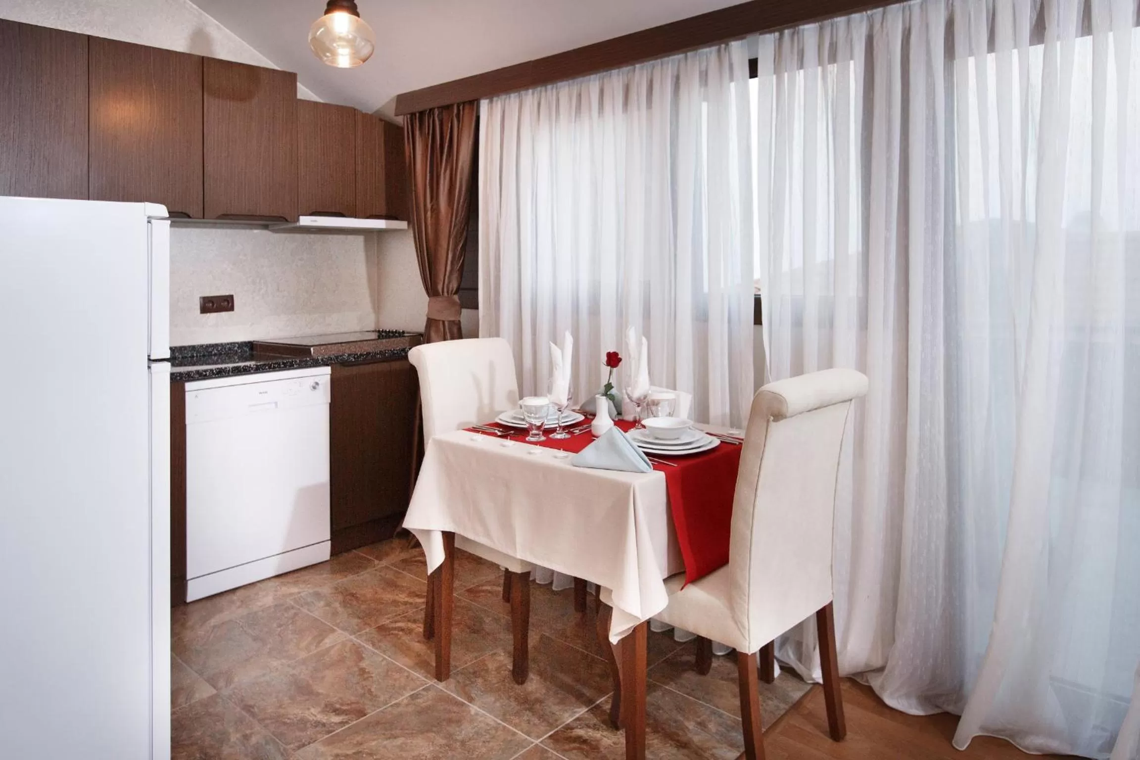 Kitchen or kitchenette in Sera Lake Resort Hotel Spa & Aparts