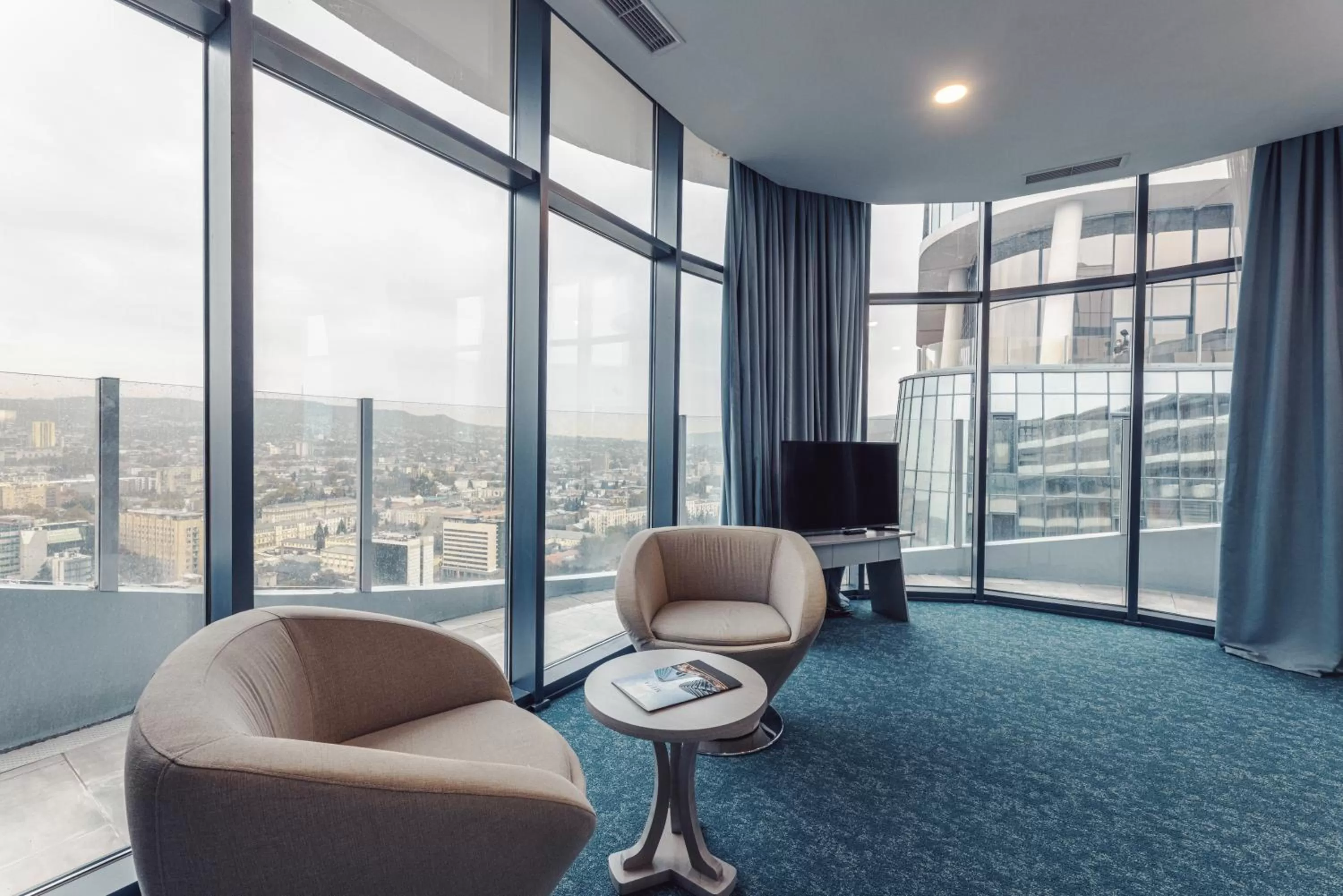 Living room in Meta Business Hotel By King David