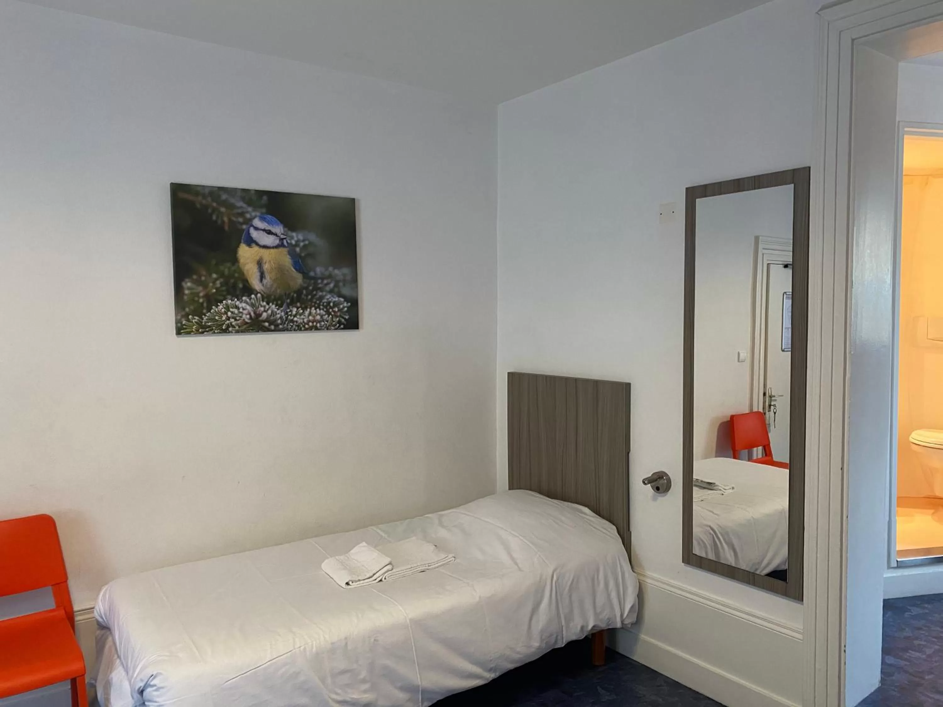 Bed in Hotel le Faisan