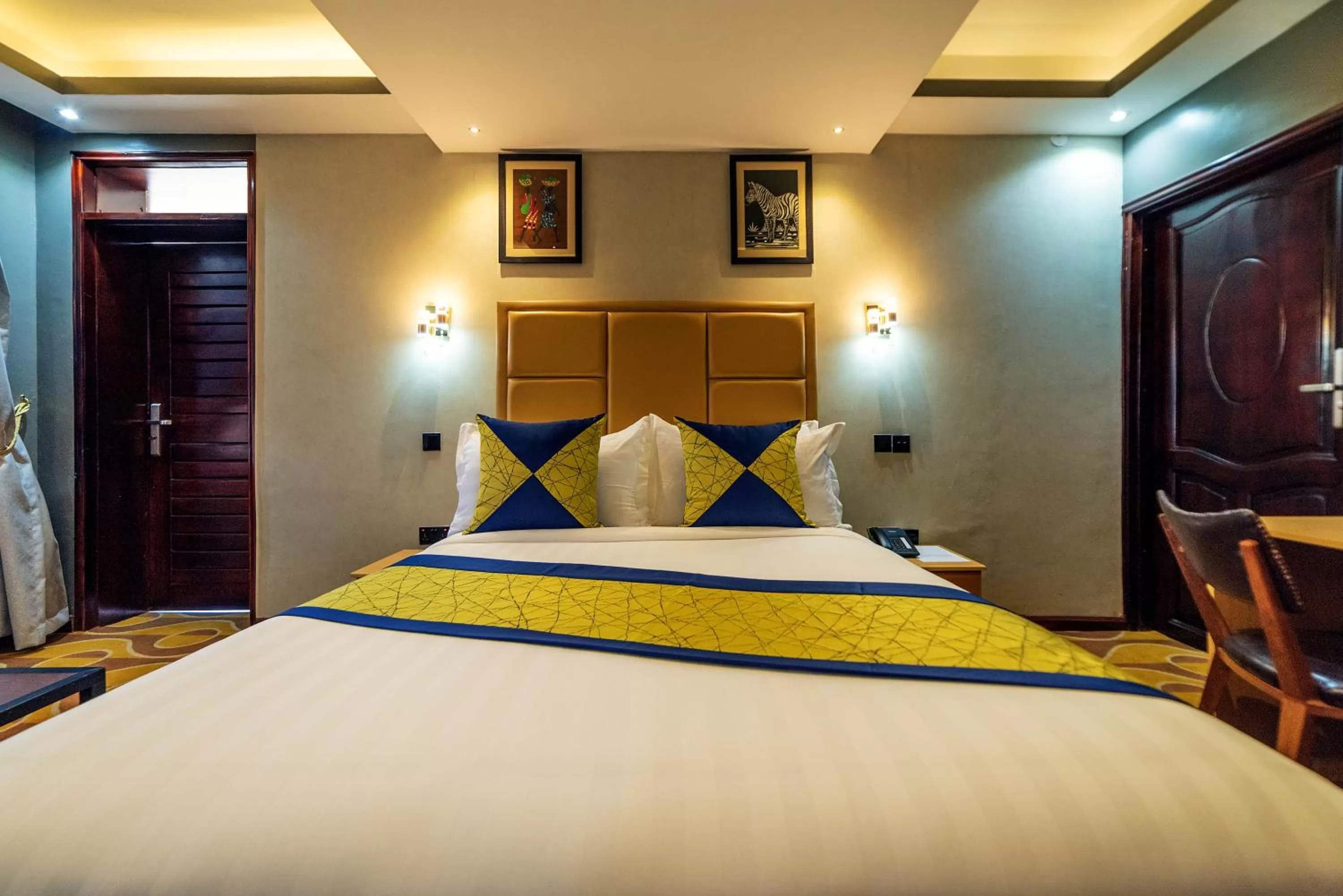 Bed in Afro Park Hotel