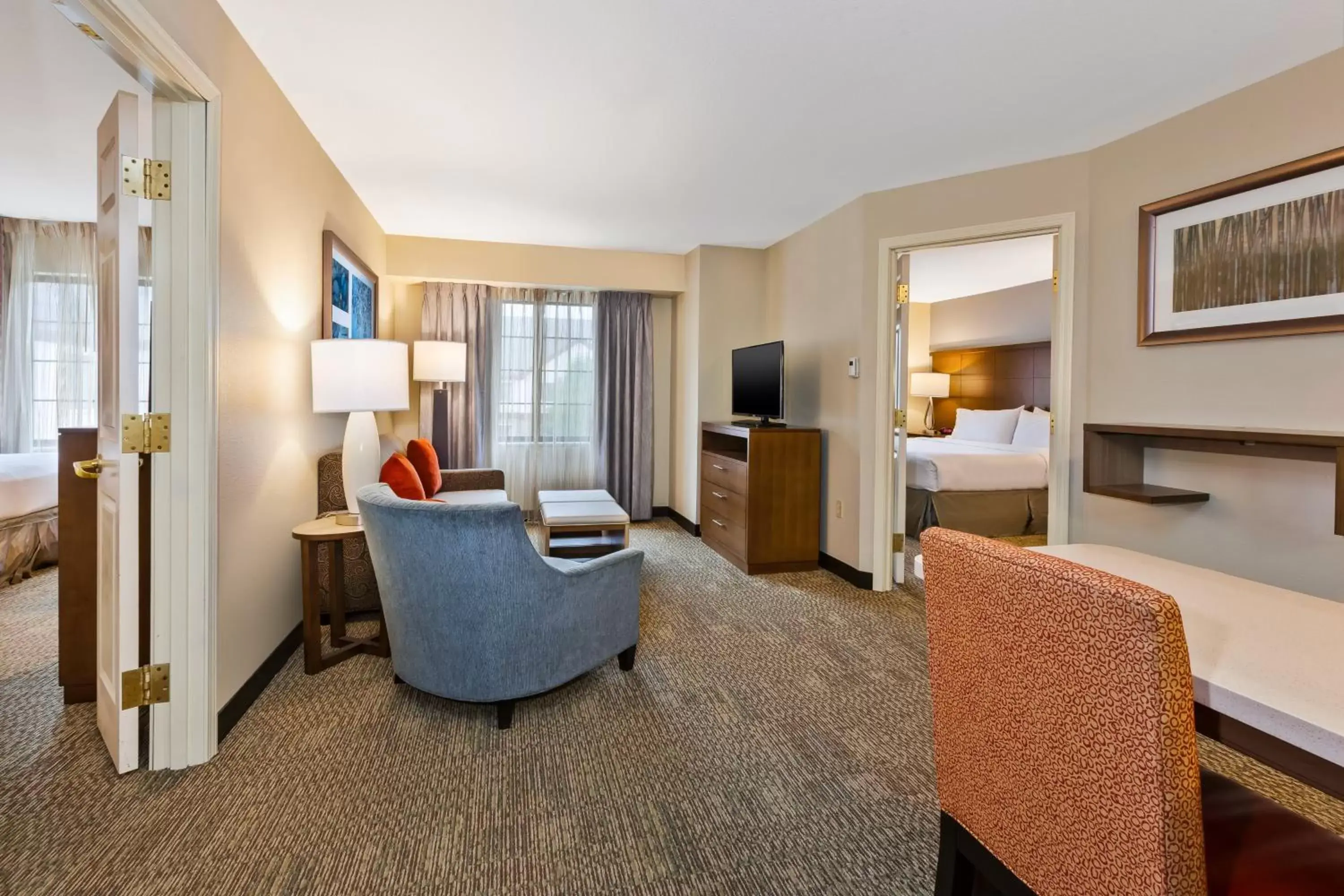 Photo of the whole room, Seating Area in Staybridge Suites Kalamazoo, an IHG Hotel