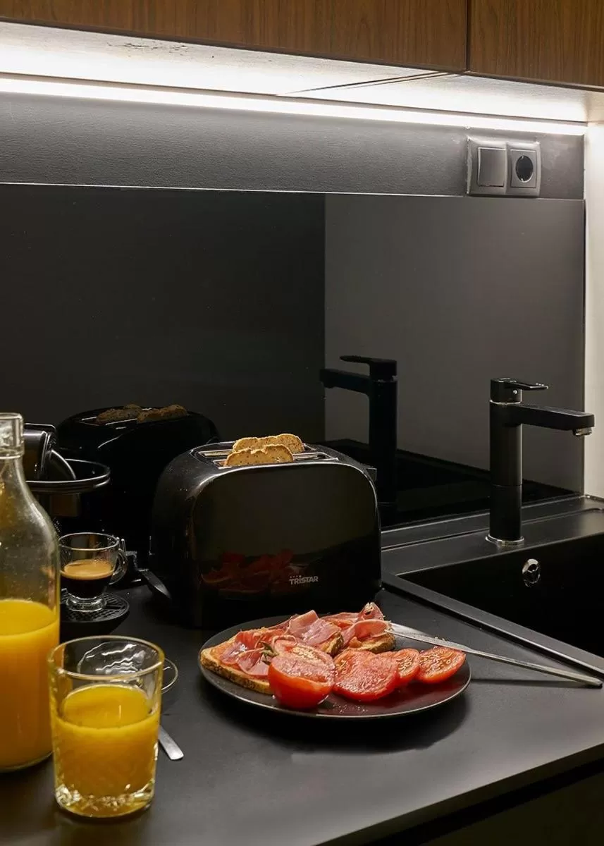 Kitchen or kitchenette in Urban Suite Santander