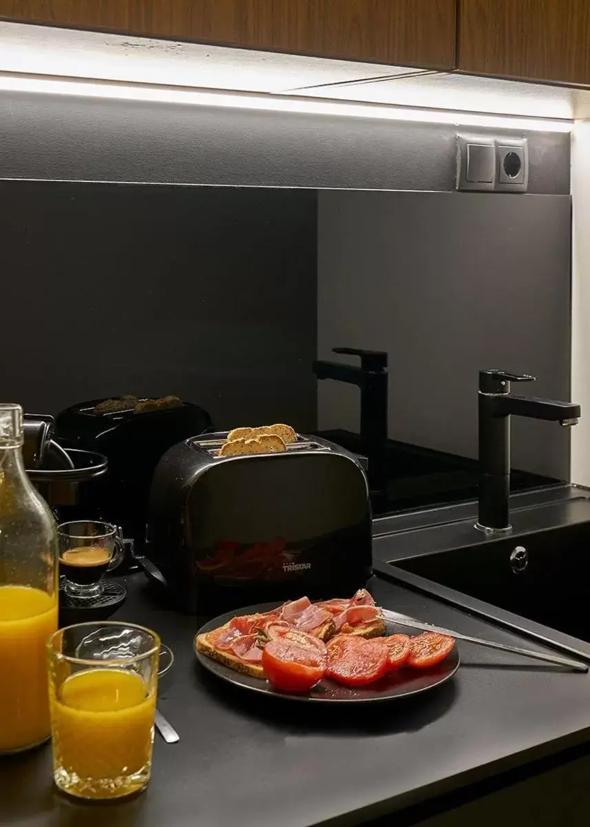 Kitchen or kitchenette in Urban Suite Santander