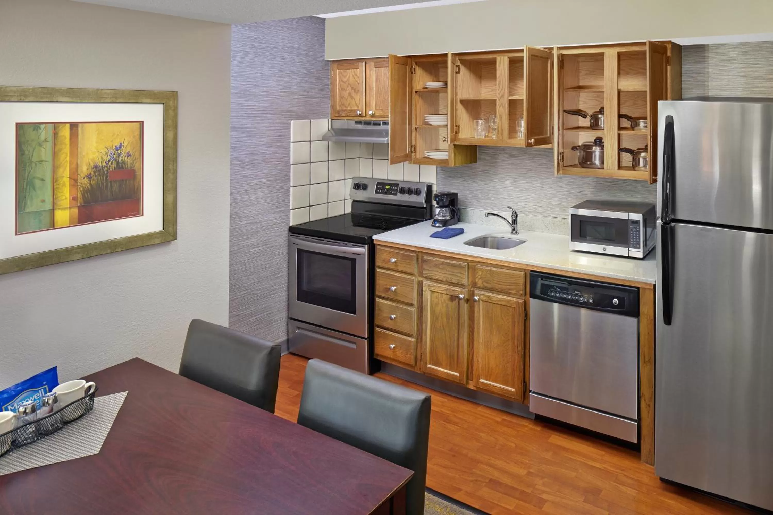 Kitchen or kitchenette in New Haven Village Suites