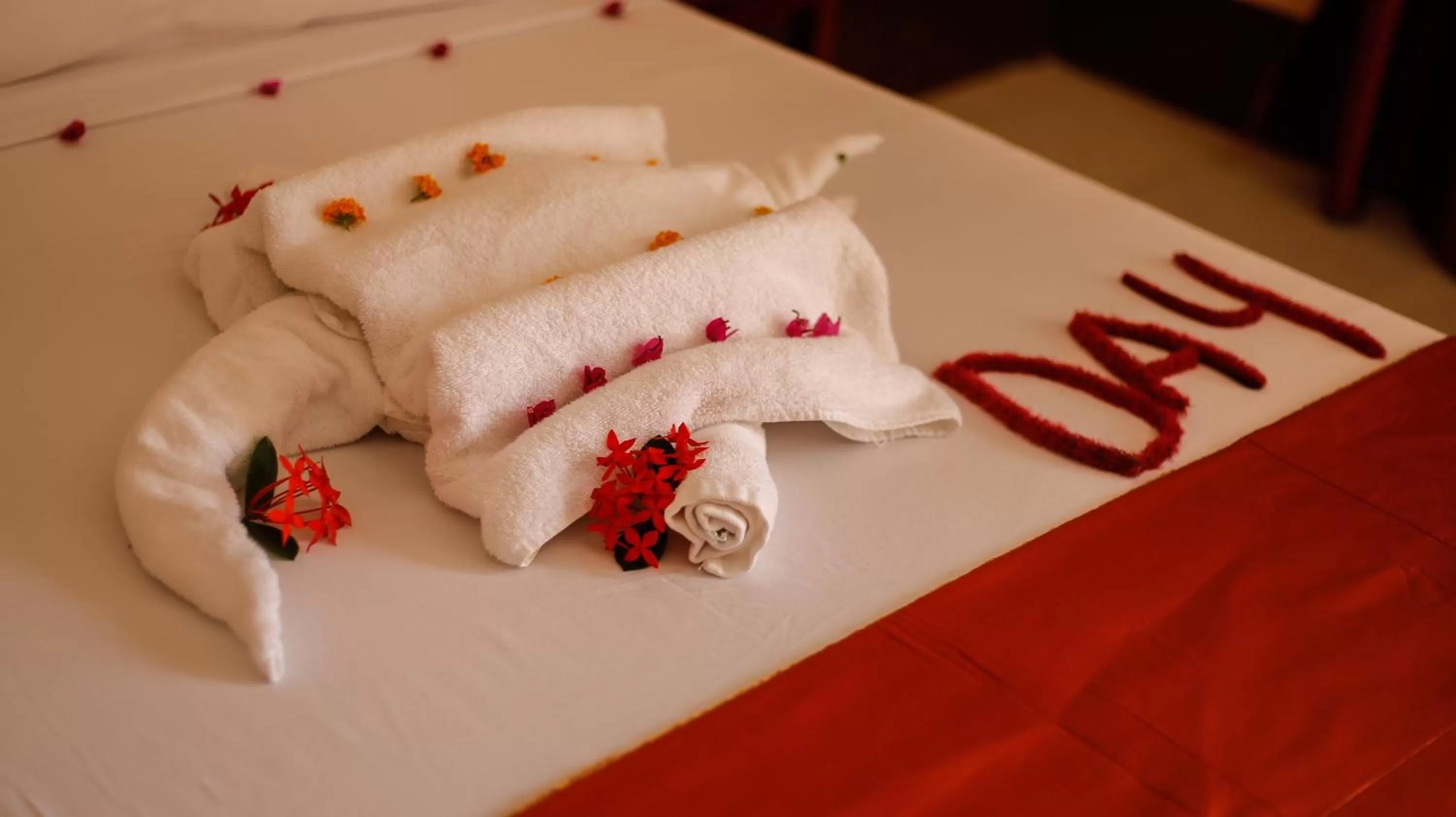 Bed in Amaan Beach Bungalows