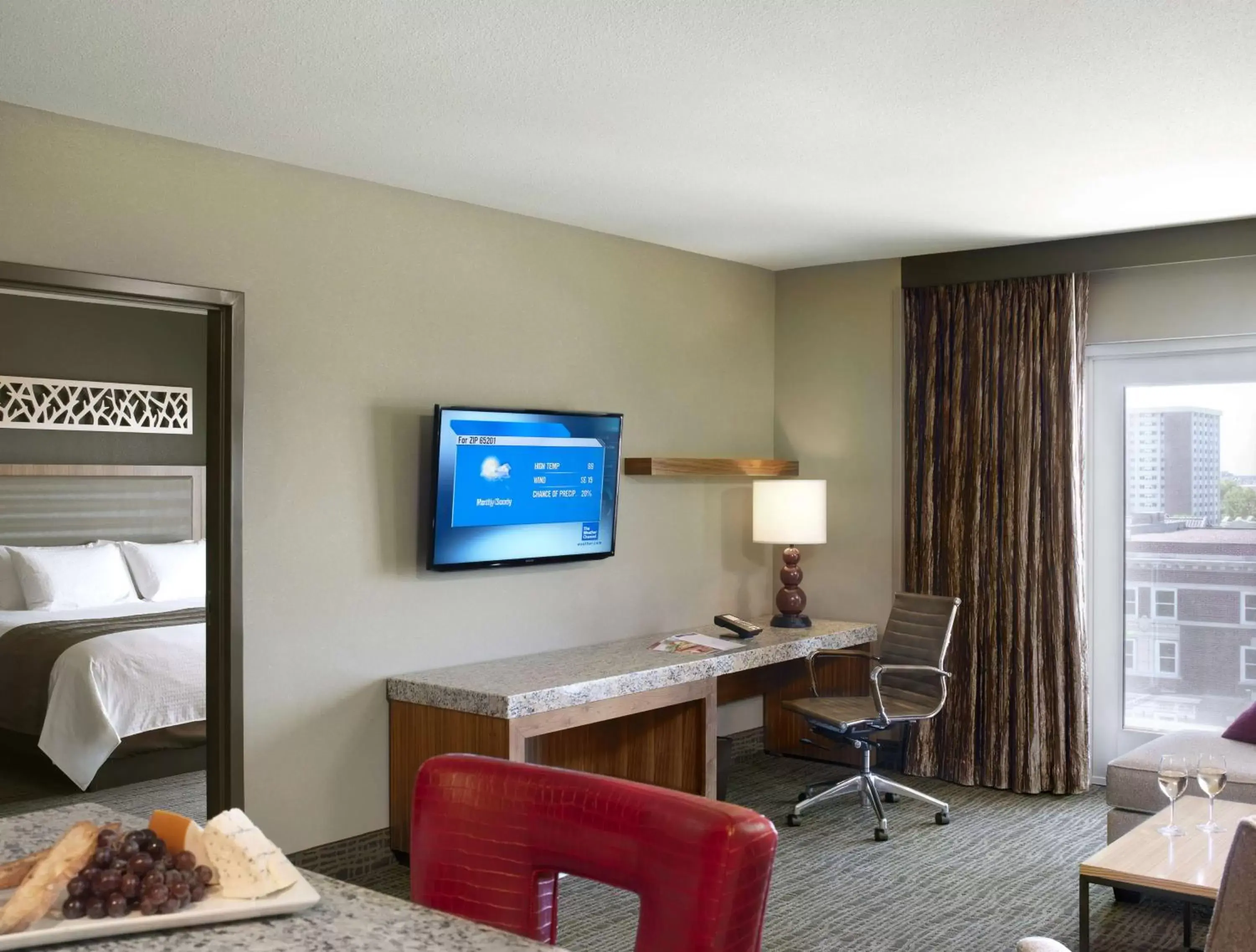 Living room, TV/Entertainment Center in The Broadway Columbia - a DoubleTree by Hilton Hotel