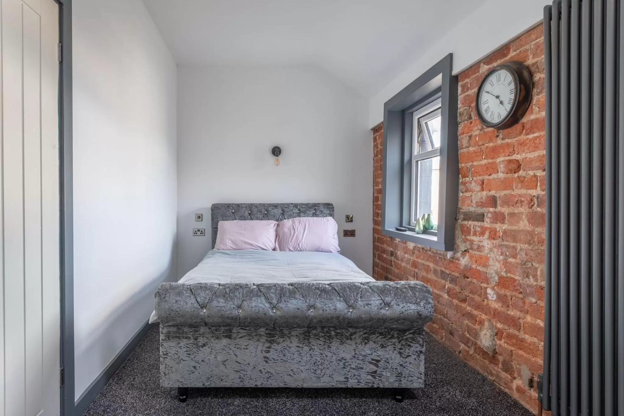 Bed in RESIDENCY LUXURY SEAFRONT HOTEL