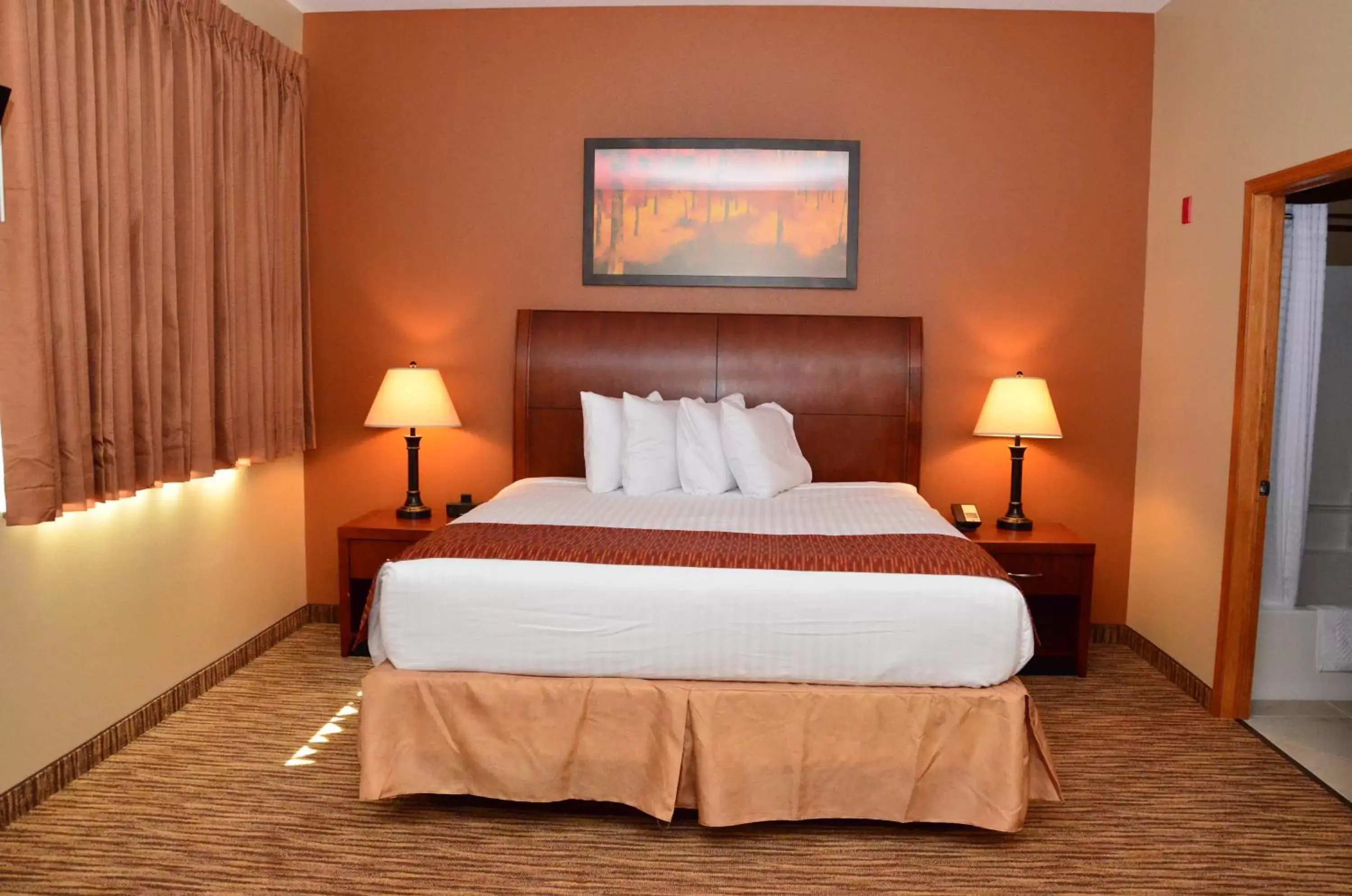 Bed in Cobblestone Inn & Suites - Newton