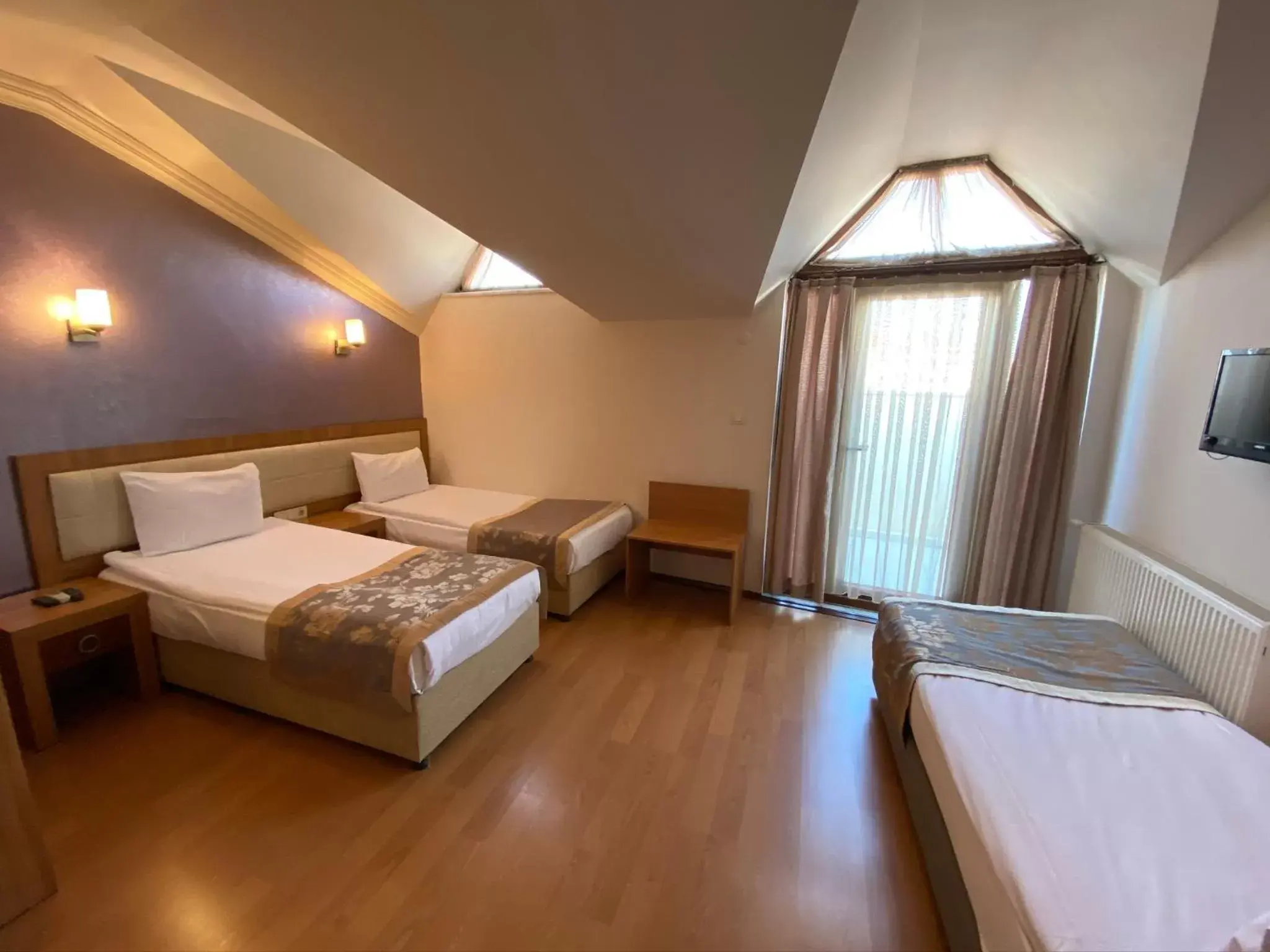 Bed in Grand Anzac Hotel