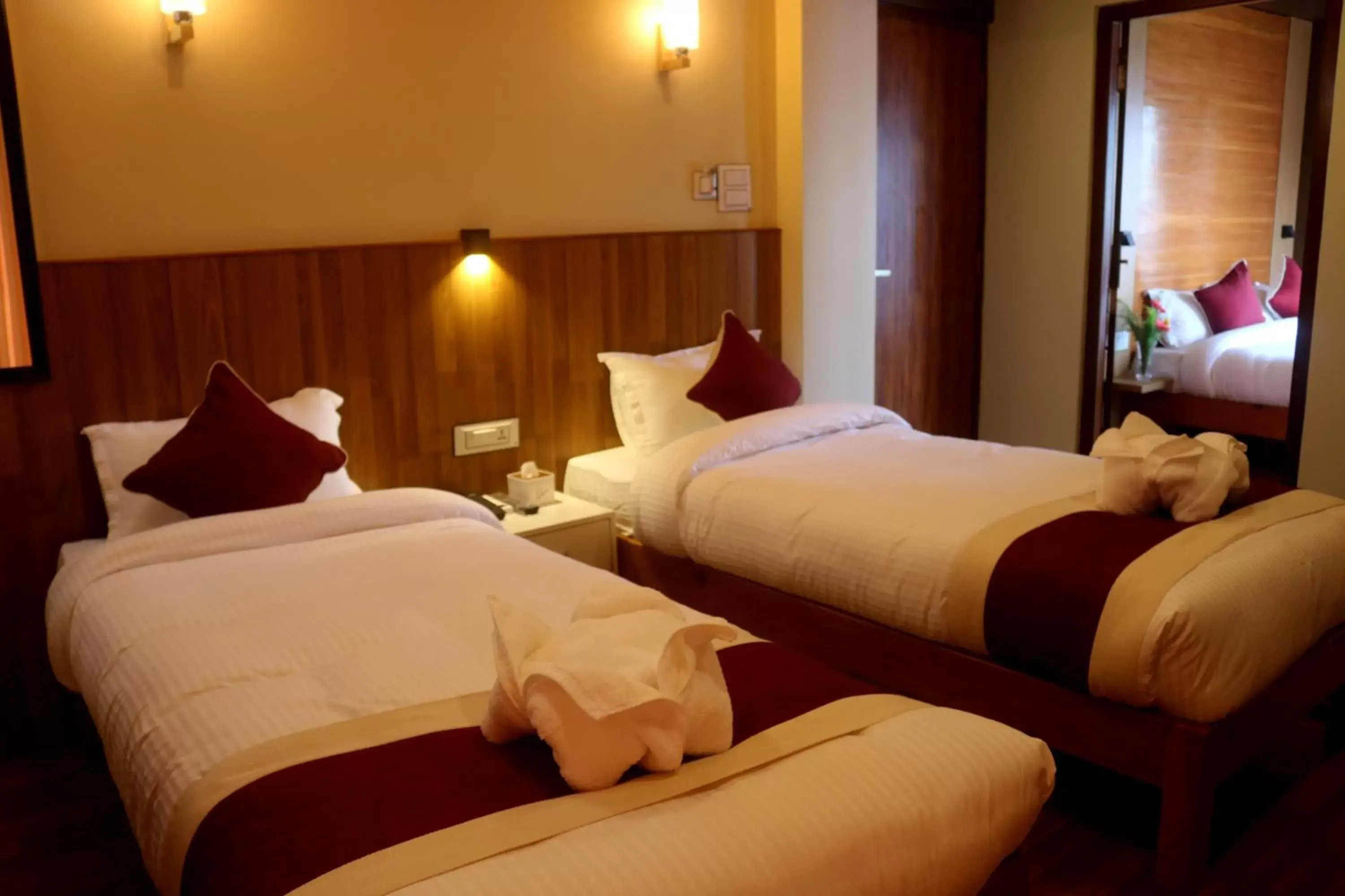 Bedroom, Bed in Hotel Family Ties Pvt. Ltd. Bedroom, Bed in Hotel Family Ties Pvt. Ltd.