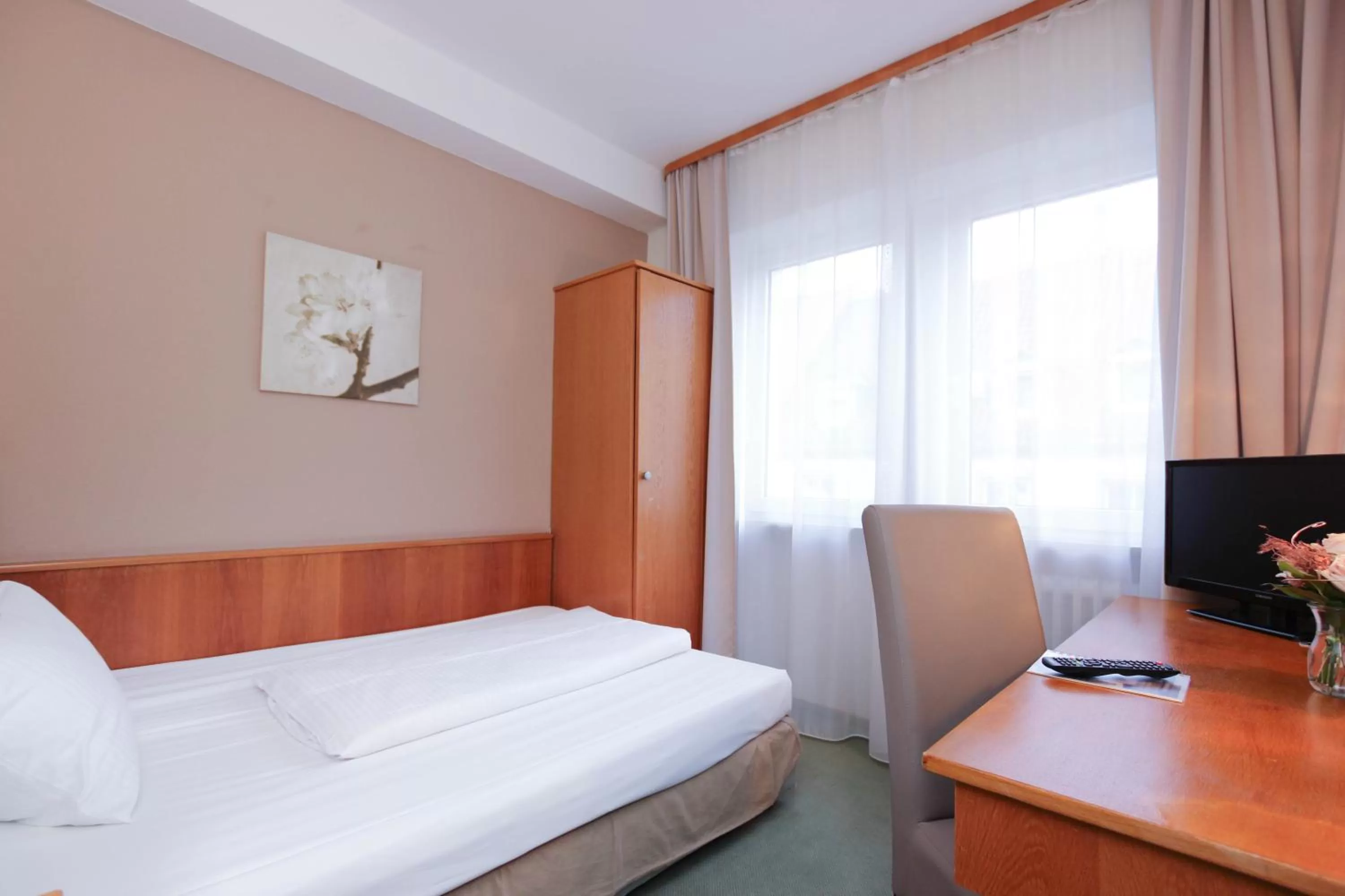 Bed in City Hotel Würzburg