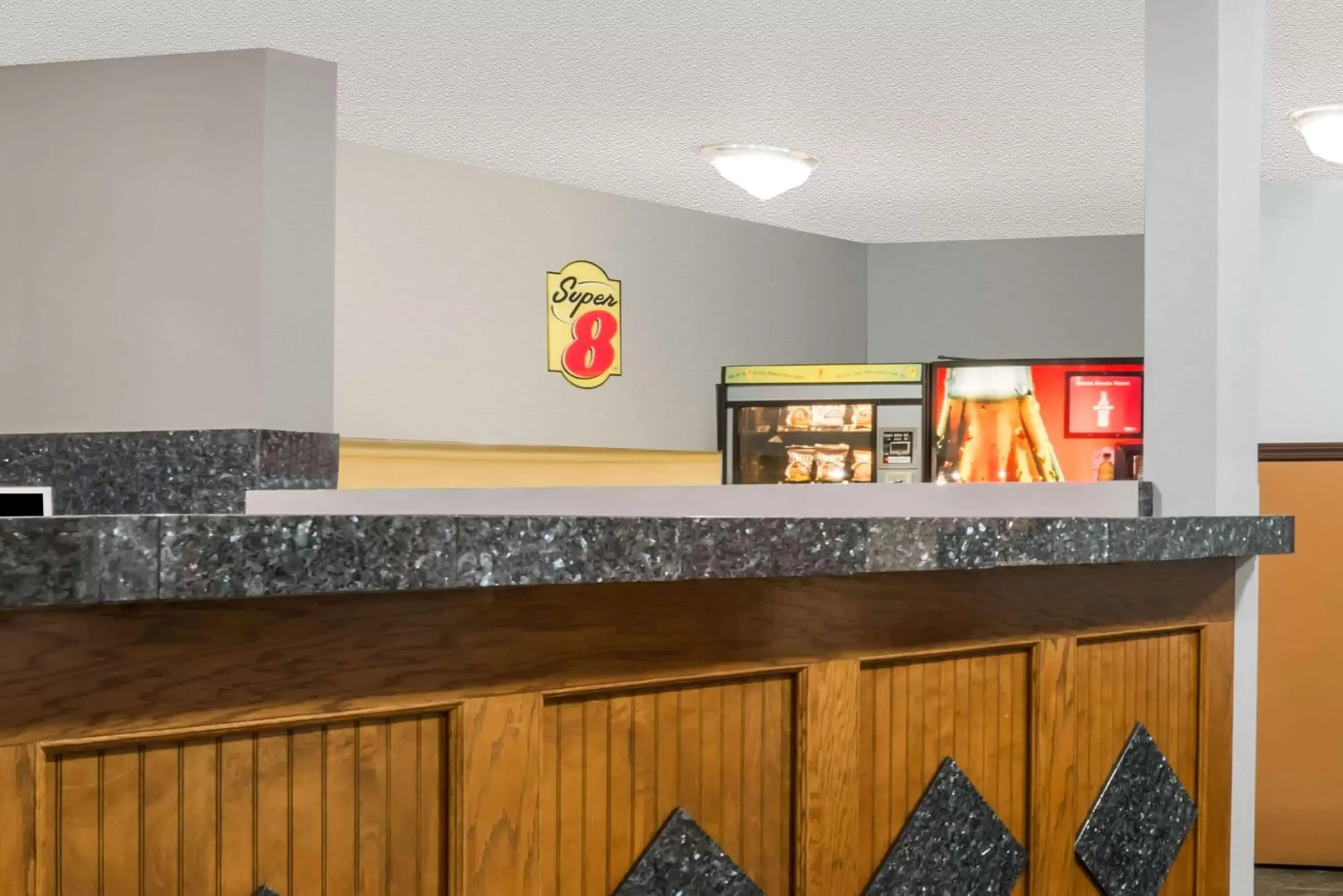Lobby or reception in Super 8 by Wyndham Topeka/Wanamaker RD/I-70 Lobby or reception in Super 8 by Wyndham Topeka/Wanamaker RD/I-70