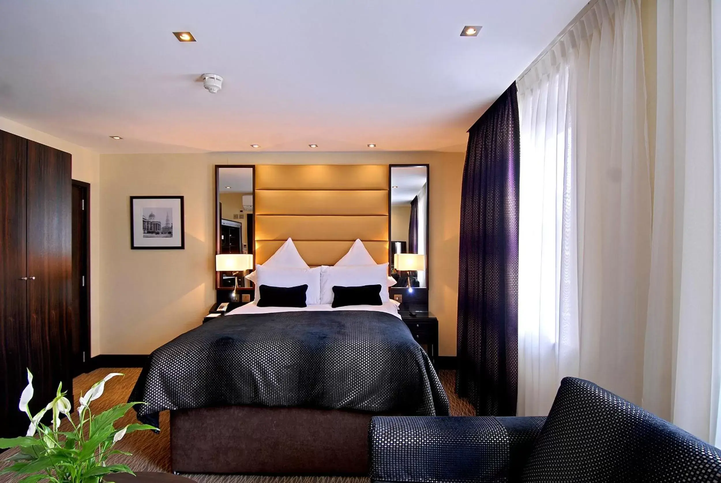 Bedroom in The Marble Arch Suites