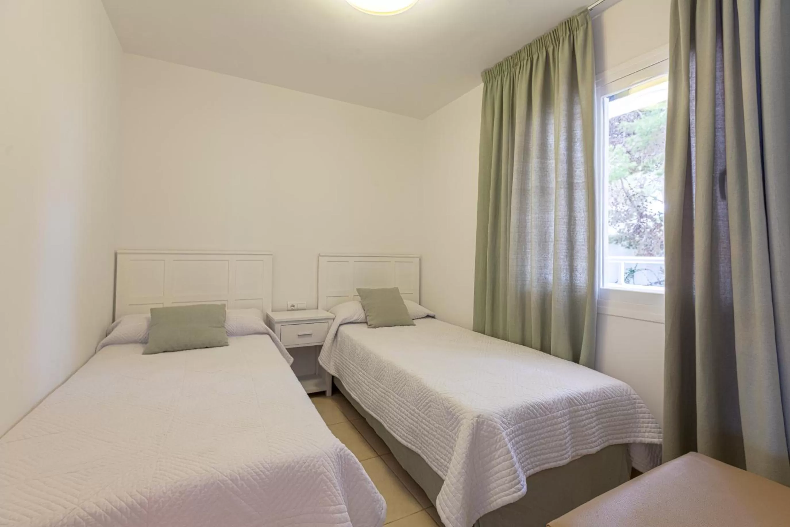 Bedroom in Camelina Suites