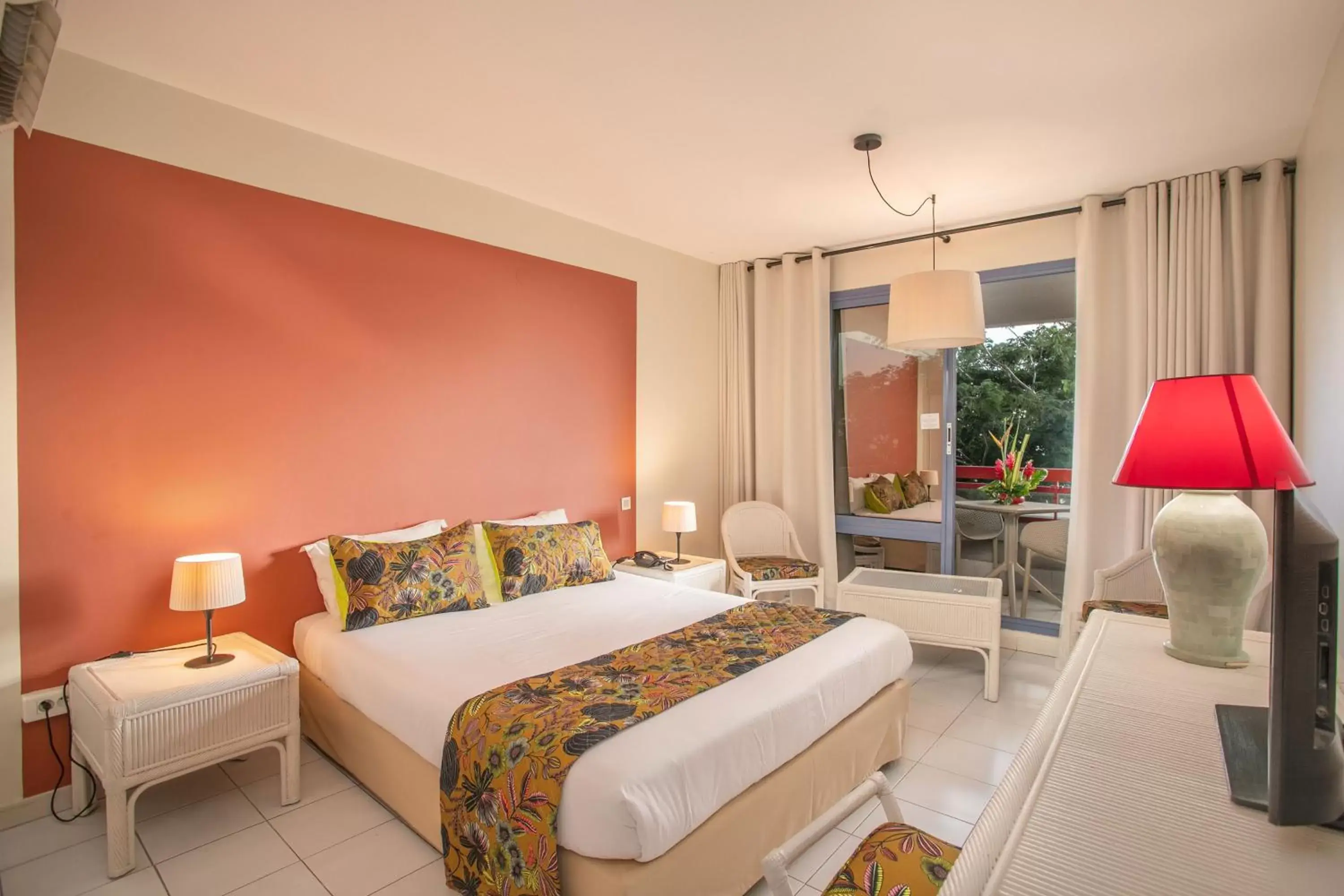 Bed in Karibea Squash Hotel & Spa